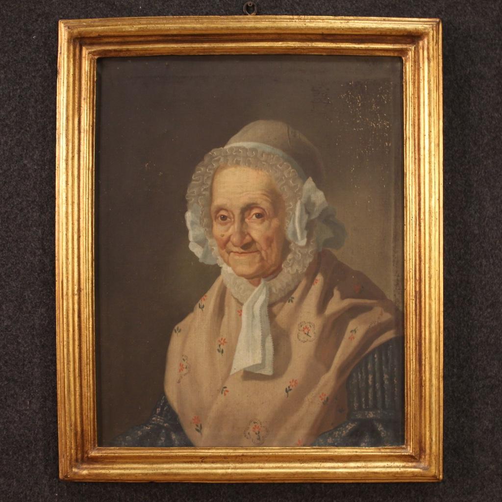 Ancient Italian painting from the late 19th century. Framework oil on canvas depicting a portrait of a pretty old woman in period clothing of good pictorial quality. Wooden frame not coeval, from the 20th century, carved, gilded and adapted to the