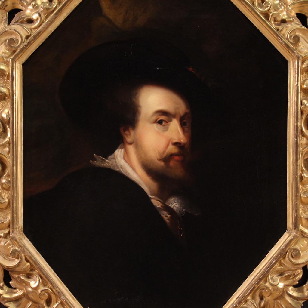 Antique Flemish painting from the first half of the 19th century. Oil on canvas artwork, first canvas, depicting a portrait of Rubens with an amazing contemporary wooden frame, carved and gilded. Octagonal-shaped painting, of nice size and pleasant