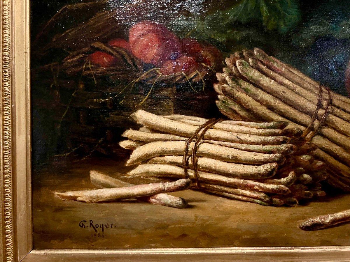 We present you this oil-on-canvas still life painting representing lettuce, beetroots and asparagus, which originates from the year 1886. It bears the signature of G. Royer. It is presented within a splendid gilded frame of 19th-century