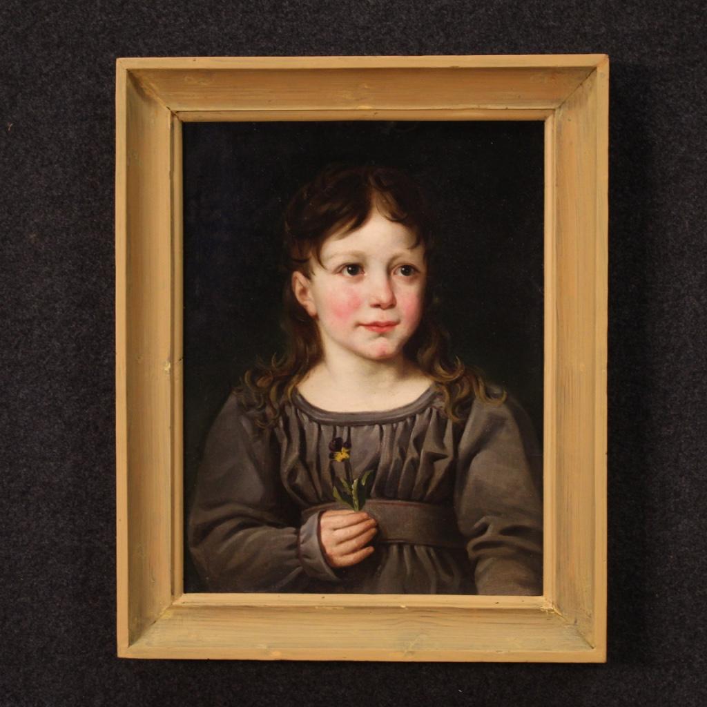 Antique Italian painting from 19th century. Oil painting on paper depicting portrait of a little girl with flower of excellent pictorial quality. 20th century painted wooden frame of beautiful decoration. High quality portrait, for antique dealers