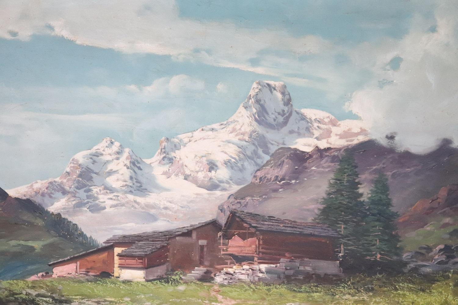 Belle peinture à l'huile ancienne sur toile des années 1880. Un splendide paysage de montagne italien avec des cabanes, c'est précisément la vallée de Veny dans la région des Alpes d'Aoste. Signé par l'artiste Gustavo Mancinelli. Mancinelli Gustavo
