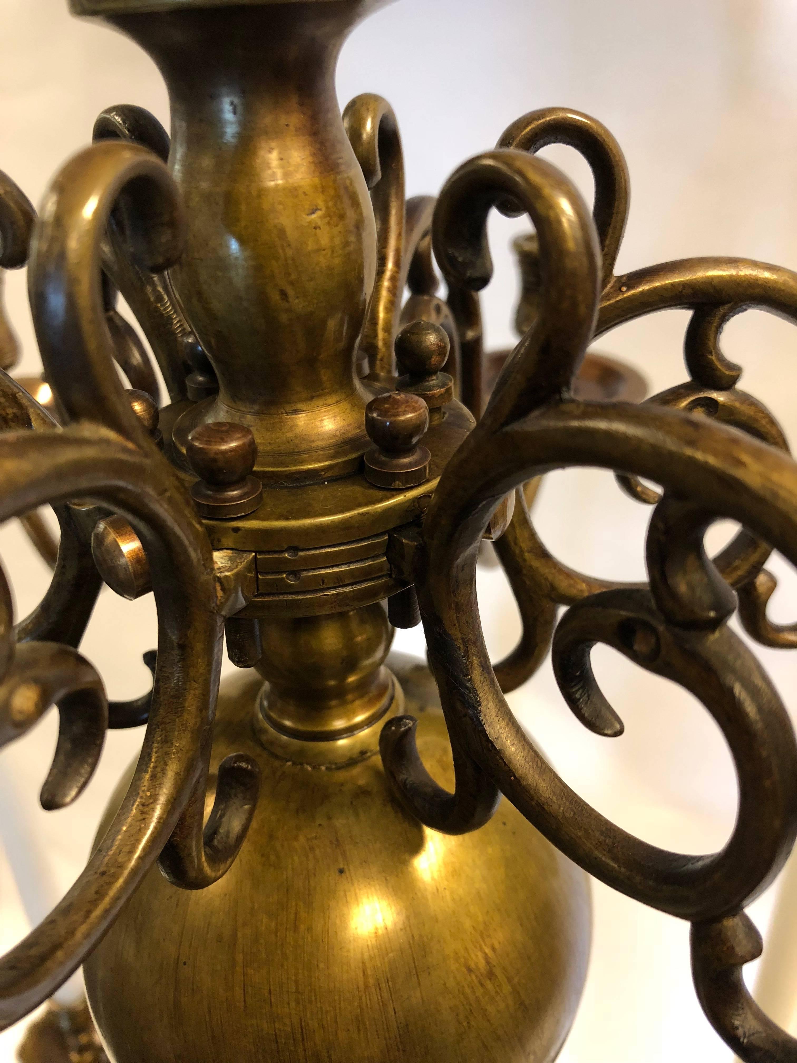 Patinated 19th Century Old Dutch Chandelier with Matching Two-Light Candleholder For Sale