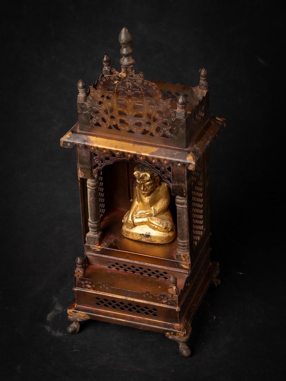 Old metal temple with antique wooden Buddha statue
Material: Metal
36,8 cm high
15 cm wide and 14,7 cm deep
The temple is originating from Nepal
The gilded Buddha is from Burma and is dating from the 19th century
Weight: 1,2 kgs
Originating from