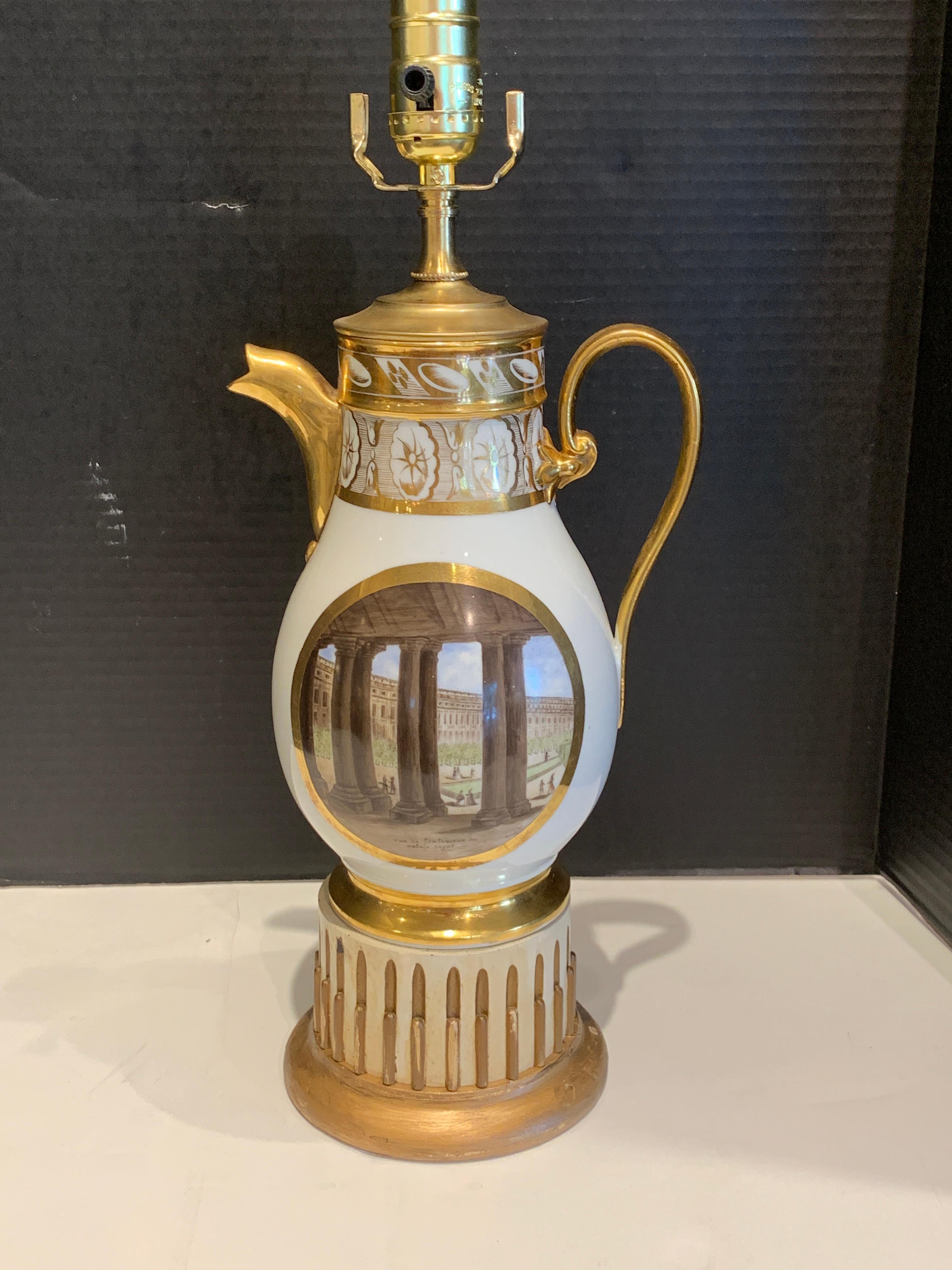 19th century Old Paris topographical coffee pot, now as a lamp
One side depicting a view of the of the Palais Royal the other side shows a view of the L’Arc Porte Saint- Denis, raised on a 5.5