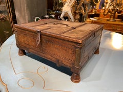 19th Century Old Portable Chest in Wood and Iron Frames Resting on Four Feet