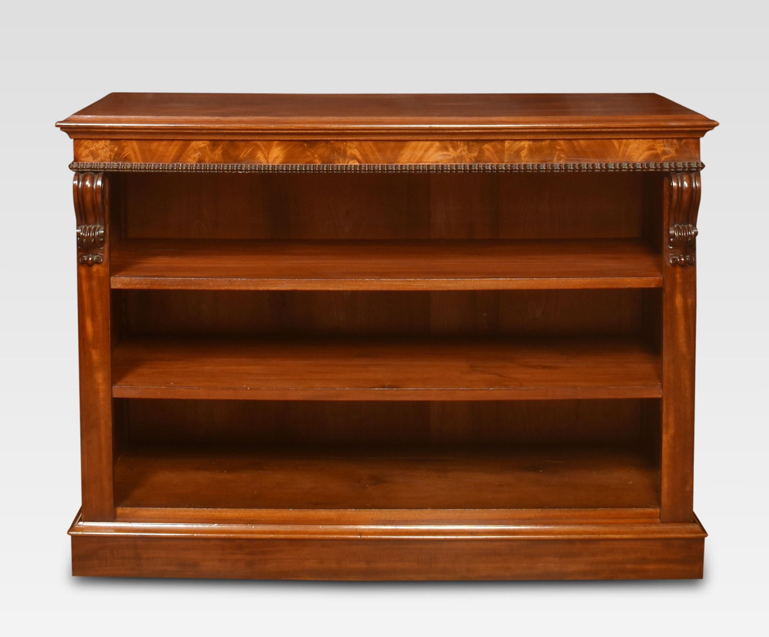 Mahogany open bookcase, the large rectangular top. Above adjustable shelved interior, flanked by scrolling capitals. All raised up on a plinth base.
Dimensions:
height 36.5 inches.
width 50.5 inches.
depth 19.5 inches.