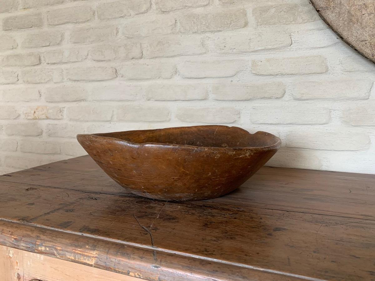 A great 19th century English bowl. Turned in Sycamore with beautiful graining, color and patina. Lovely natural fluent lines.