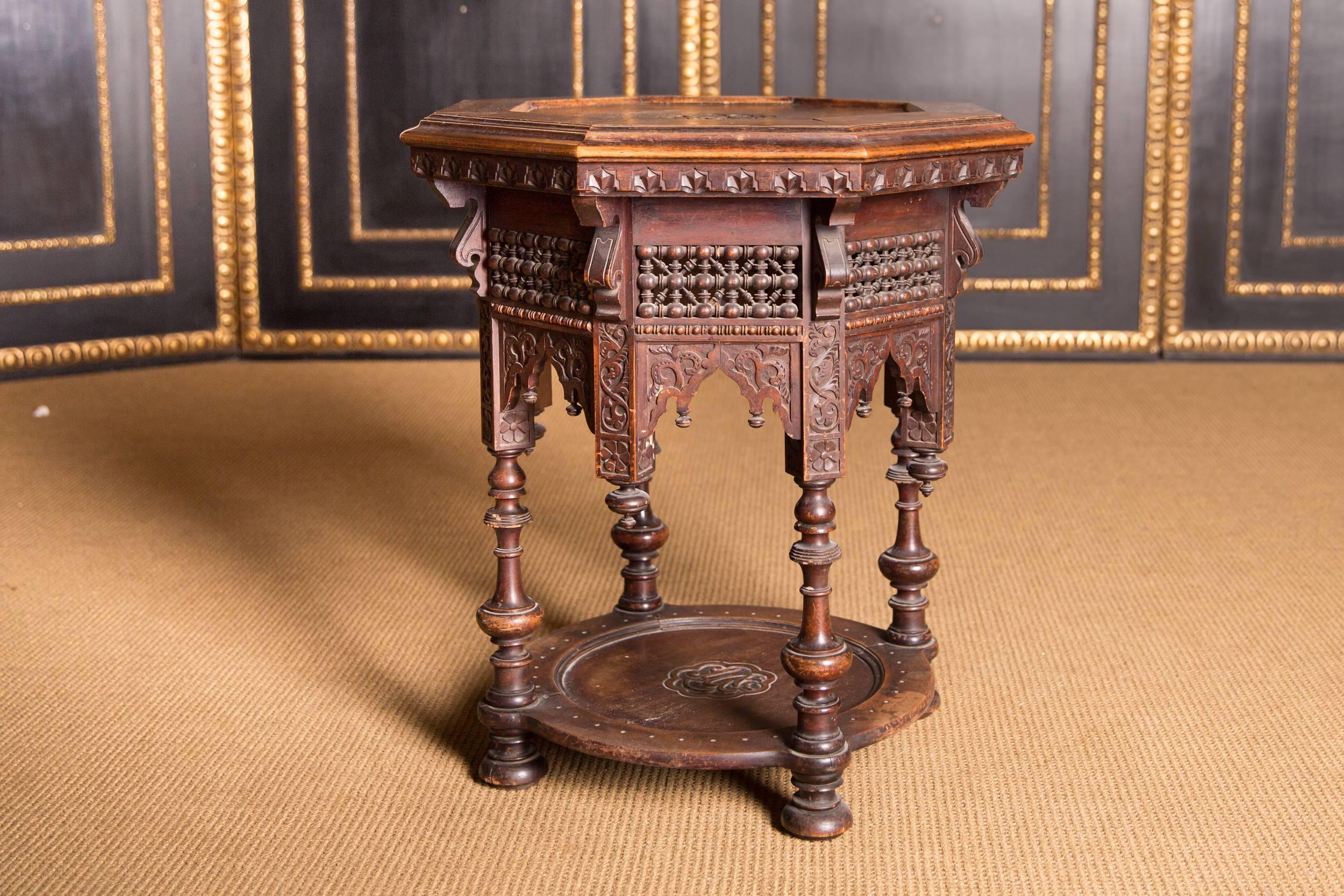Solid wood with various inlays. Beautifully turned.

This type of furniture was very popular in Europe in the 19th century.