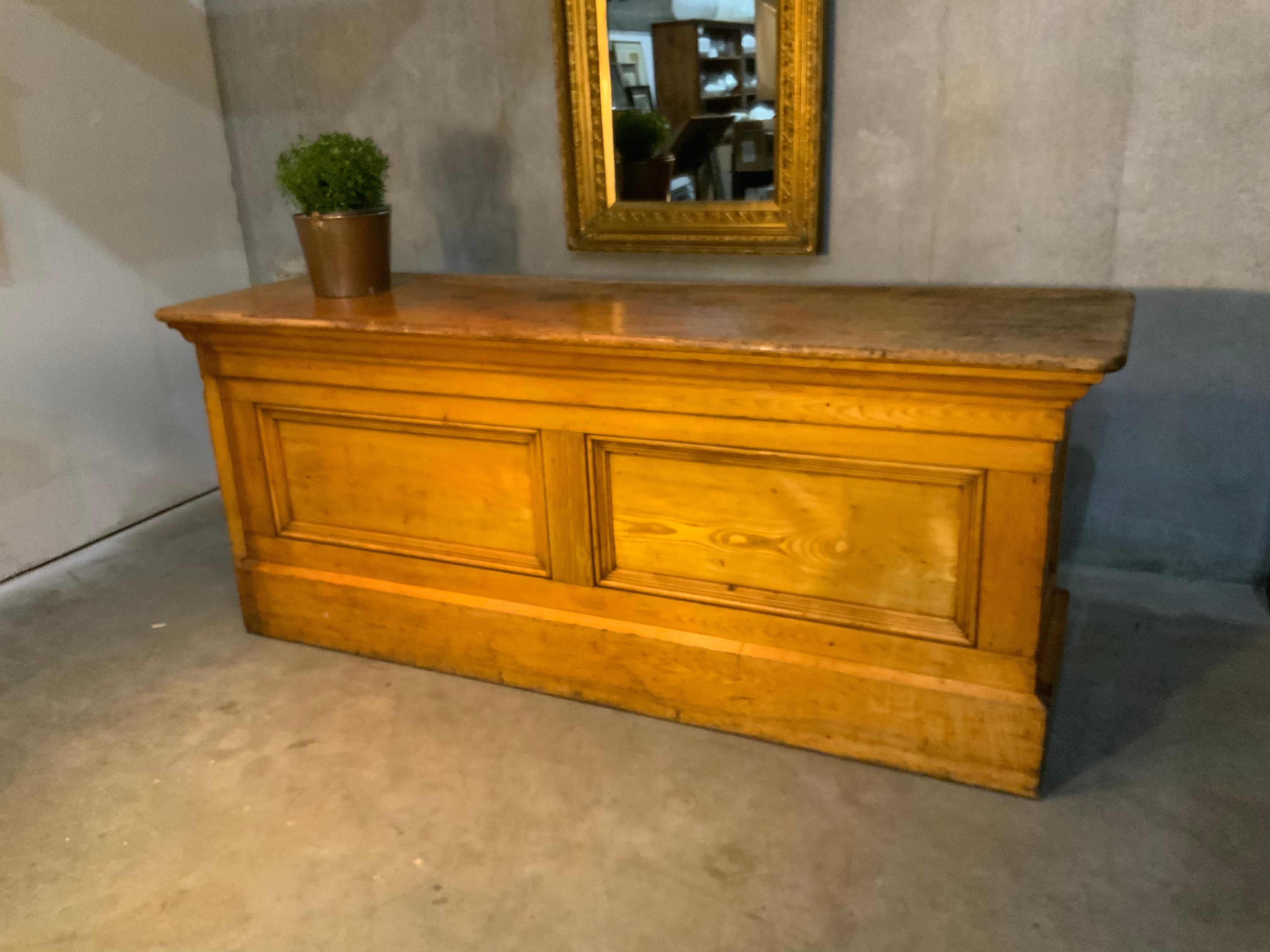 A very good store counter balanced with multi panels and 4 working doors at the back portion for storage. This example is untouched with a swing door (not shown) mountable on the side. This is perhaps one of the best we have had. Patina and finish