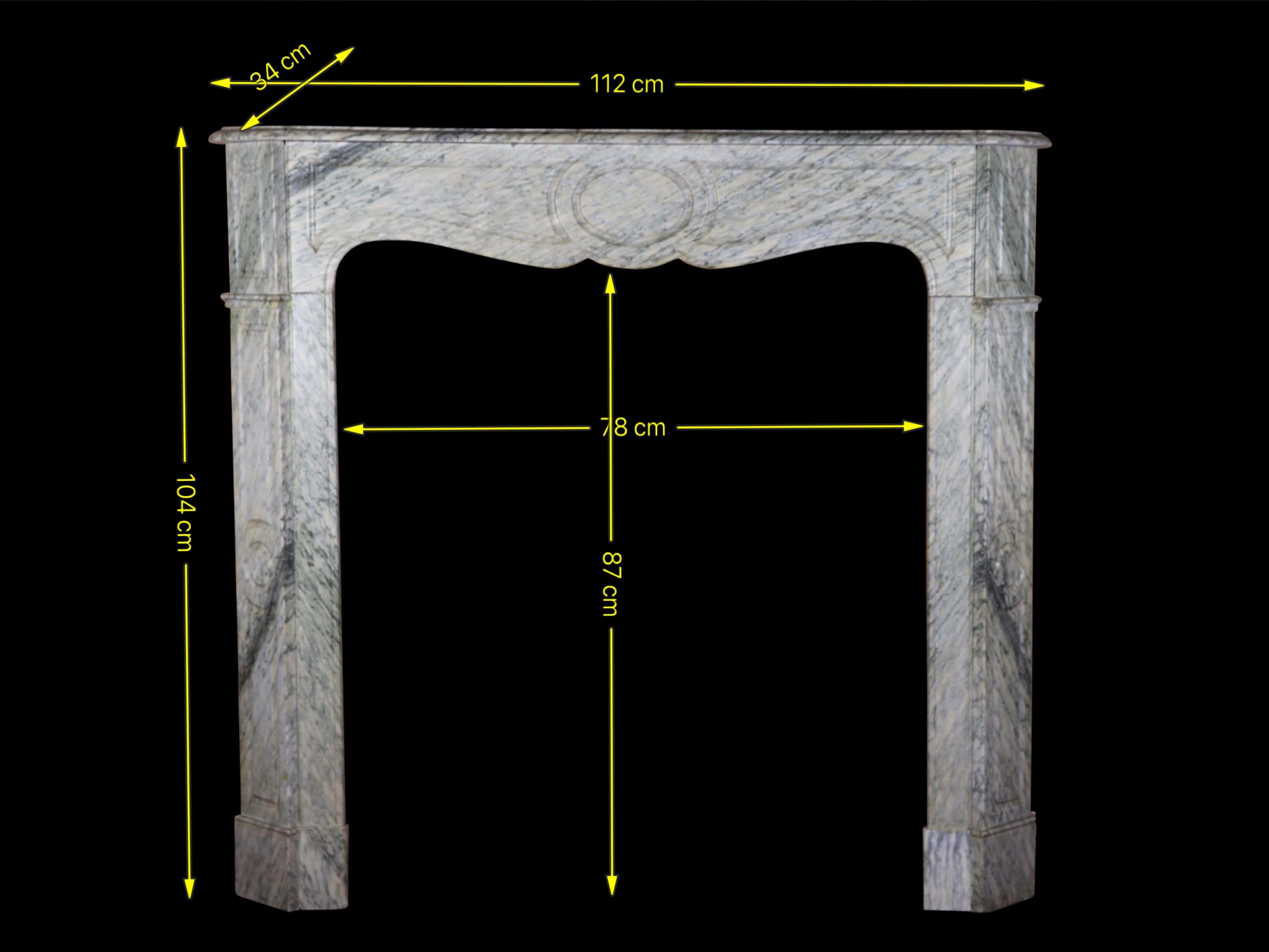 Fine Campan Vert marble vintage and decorative bedroom fireplace in the Pompadour style of the 19th century. The creator paid attention to the veining of the marble. A nice book-matched design work of the marble.
Measurements:
112 cm Exterior Width