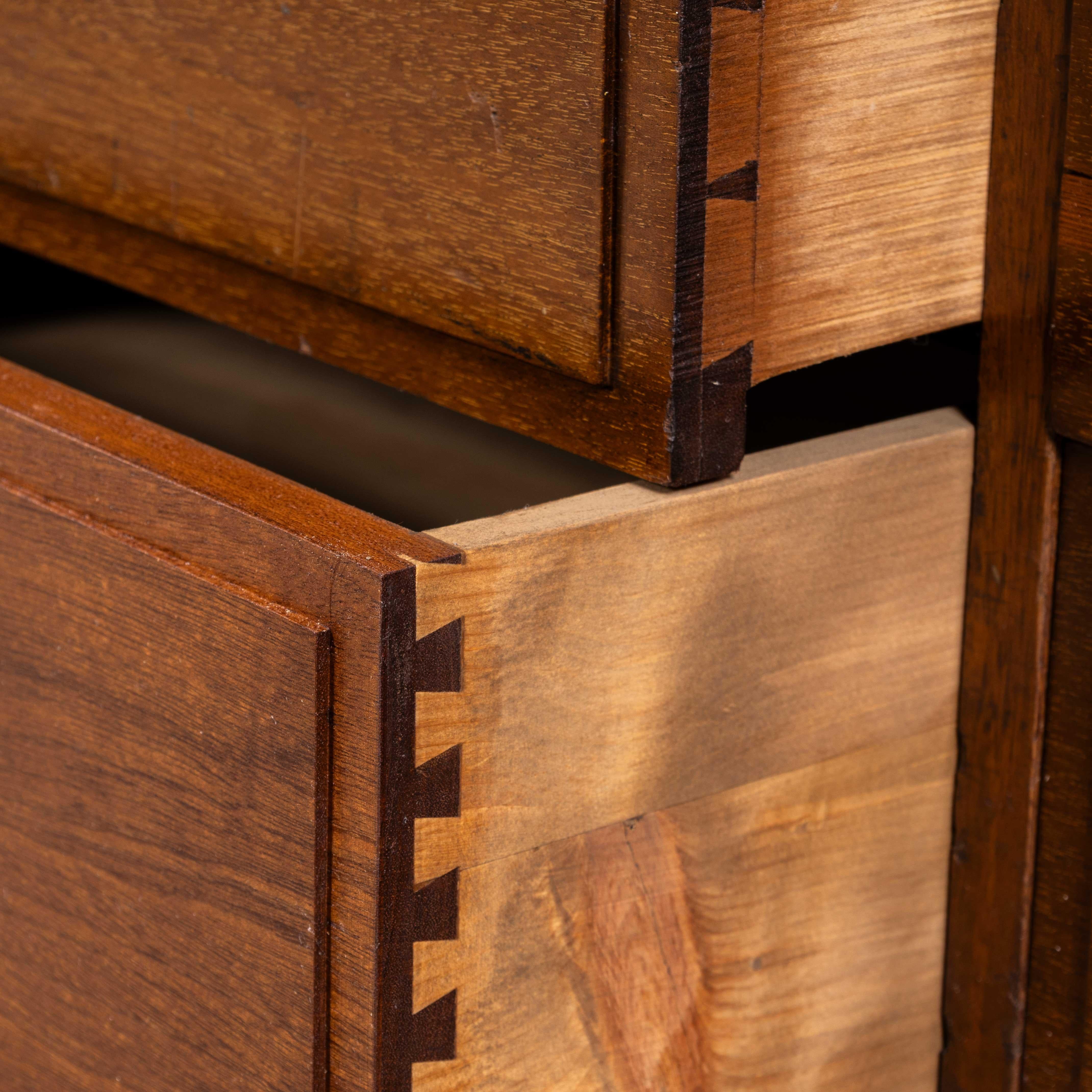 19th Century Original Mahogany Tailors Bank Of Drawers
19th Century Original Mahogany Tailors Bank Of Drawers. Unusual English bank of drawers from a tailors shop. The drawer unit is beautifully made with panelled construction throughout, dovetail