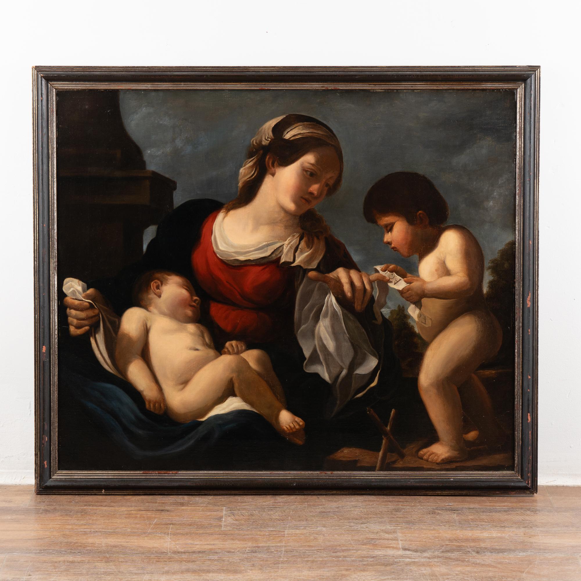 Striking original oil on canvas painting of Madonna and child with the infant Saint John the Baptist. Unsigned.
After the original by Guercino (Giovanni Francesco Barbieri) dated ca. 1615 at National Galleries of Scotland.
Condition: Retouches and