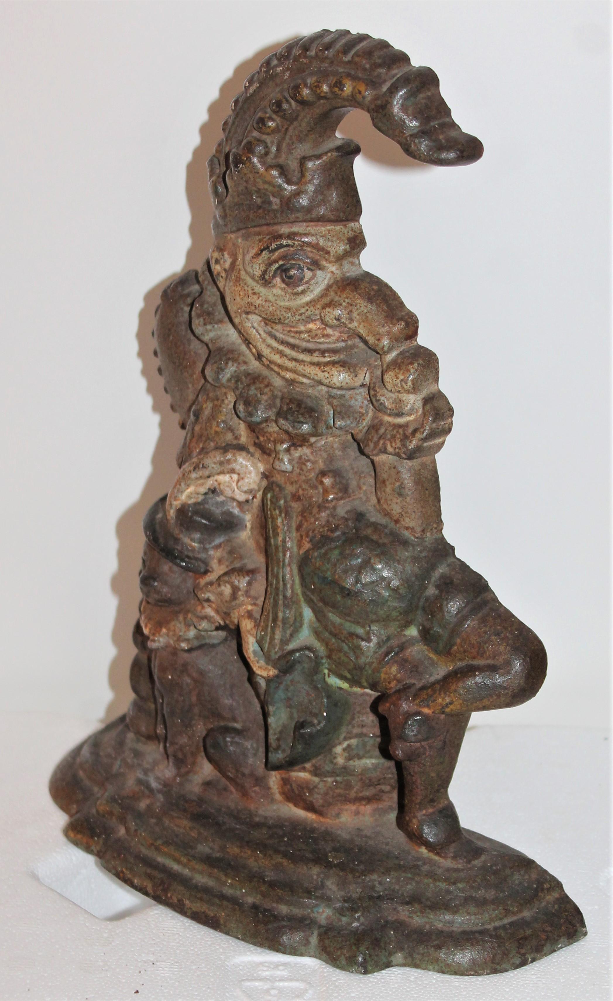 This 19th century and dog original painted Hubley cast iron door stop. This guy is in great condition and weighs a ton!