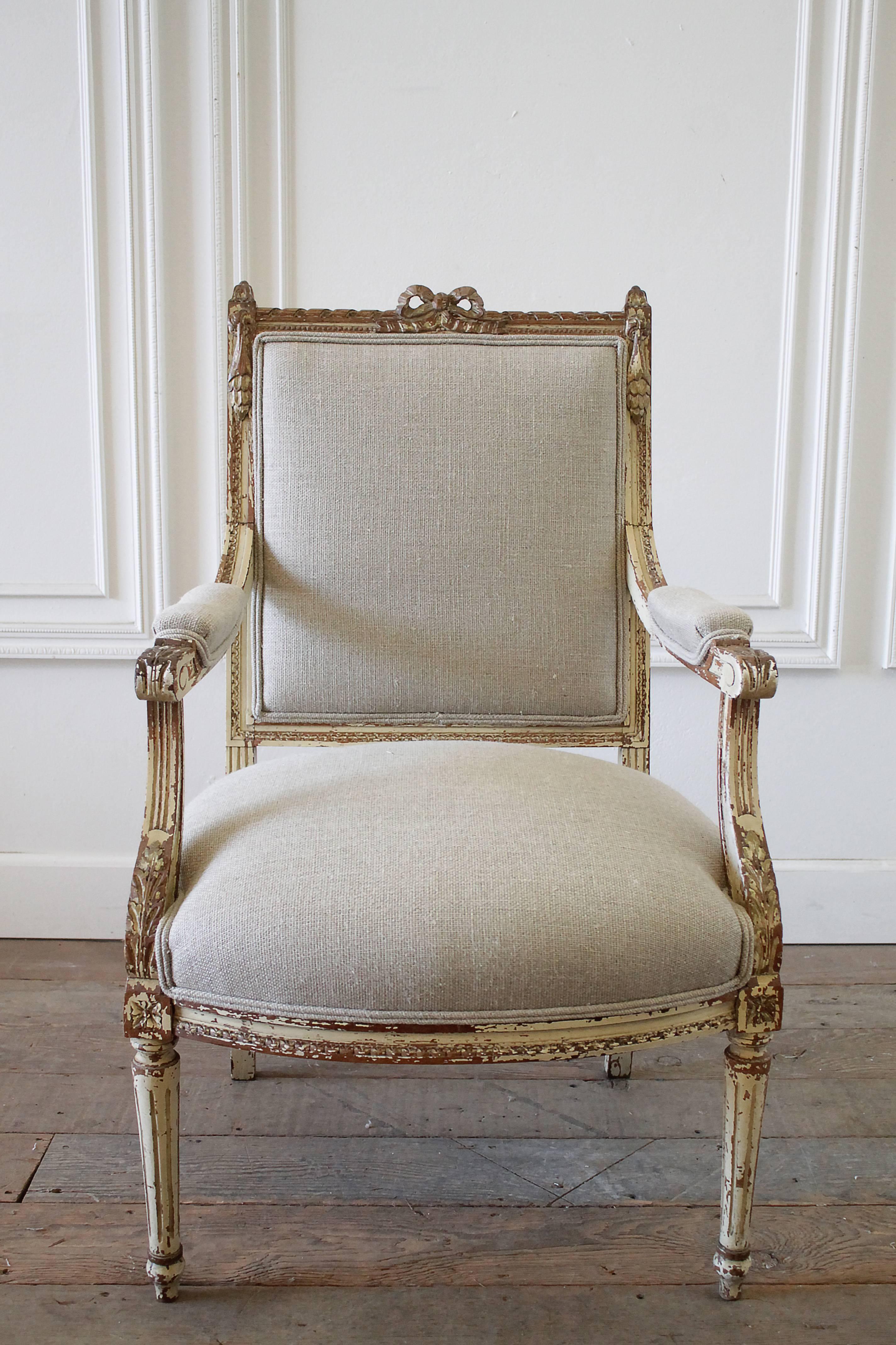 19th century carved Louis XVI style ribbon chair upholstered in Irish linen
Original paint finish, perfectly weathered showing the raw wood, paint is in creams and whites. I used a beautiful organic Irish Linen in a thick soft nubby burlap like