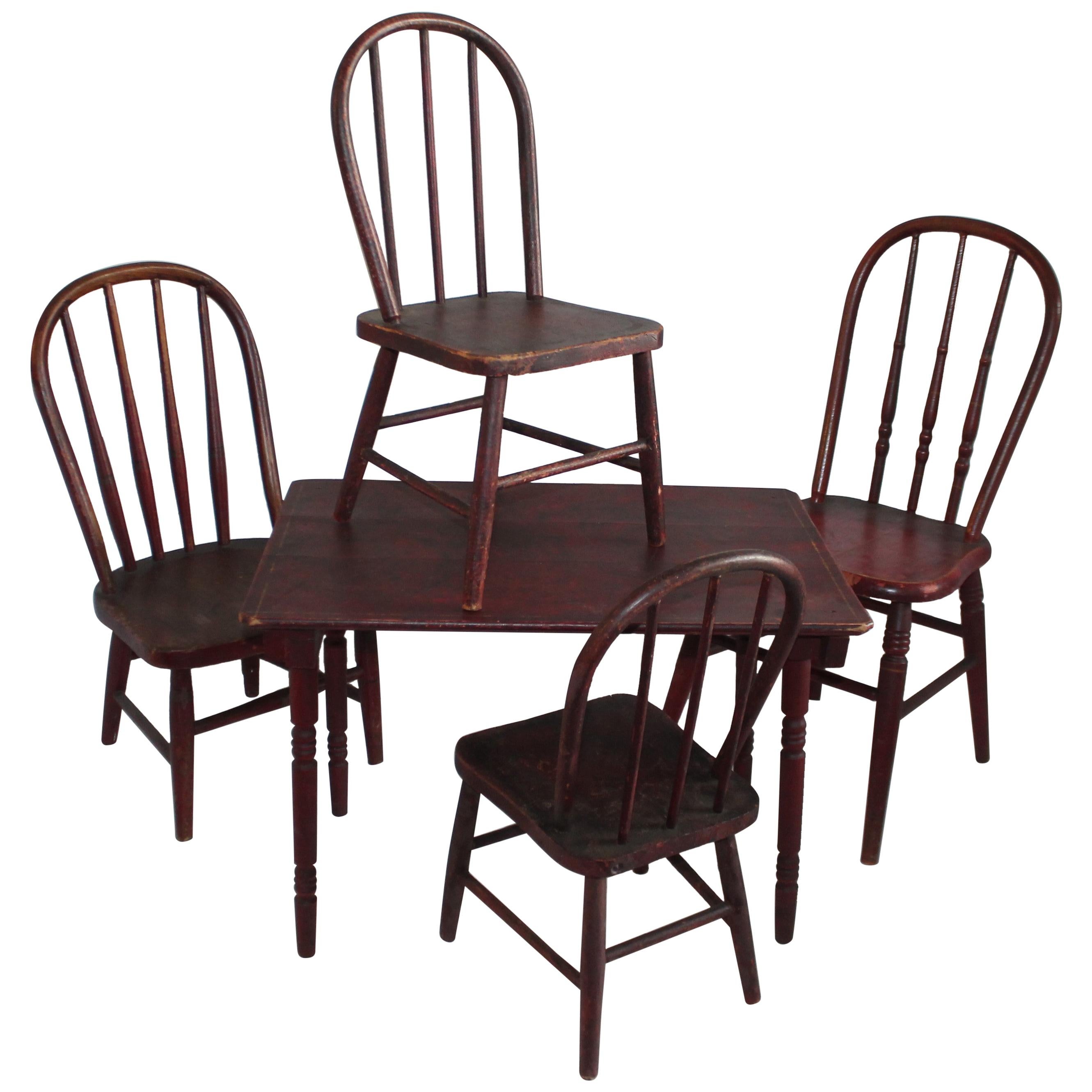 19th Century Original Red Painted Children's Table and Collection of Four Chairs