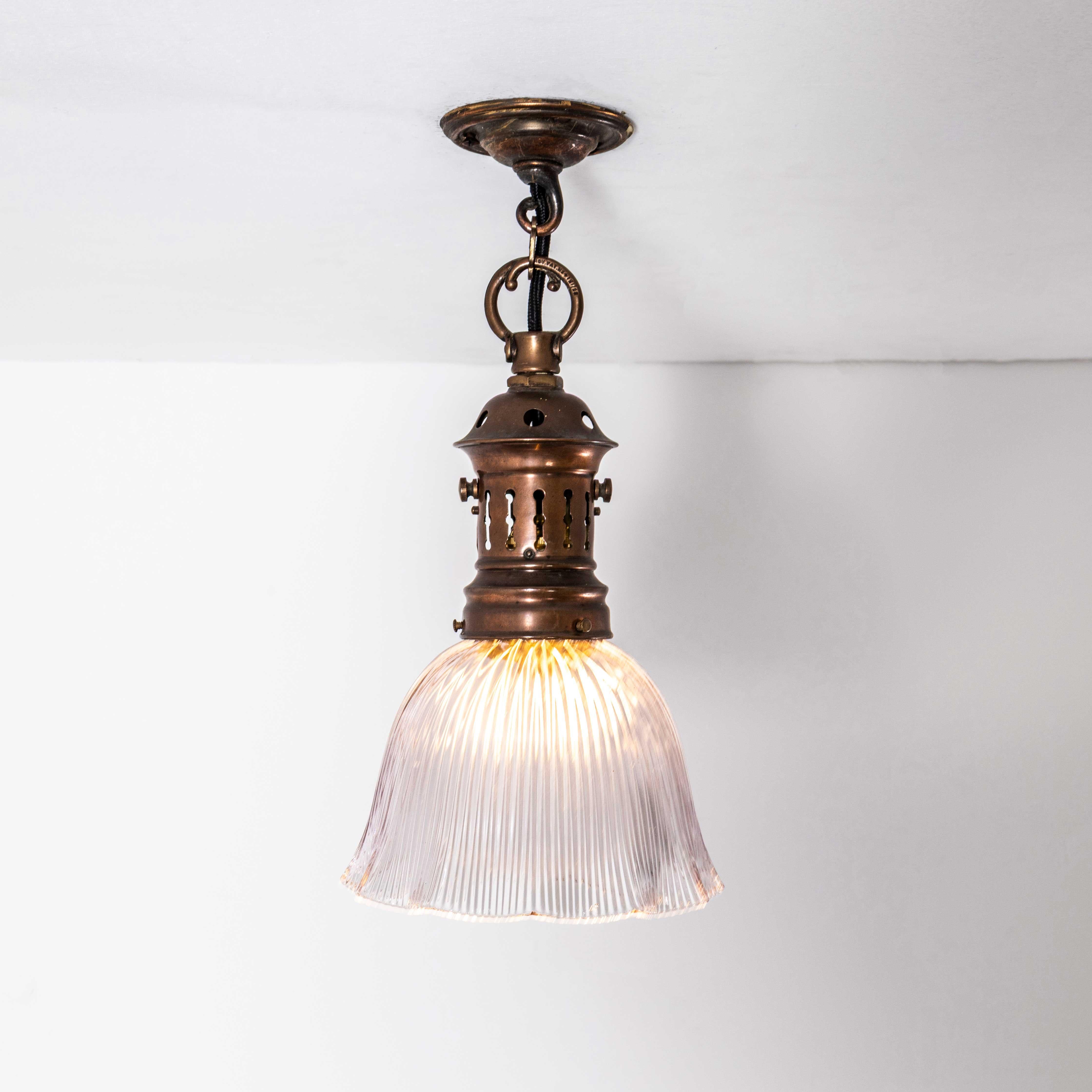 19th Century Original Single Copper Holophane Pendant Lamp. 
Holophane was founded in France in the late 19th Century and they are famous for their inventing and perfecting borosilicate glass reflectors often with intricate cast glass patterns which
