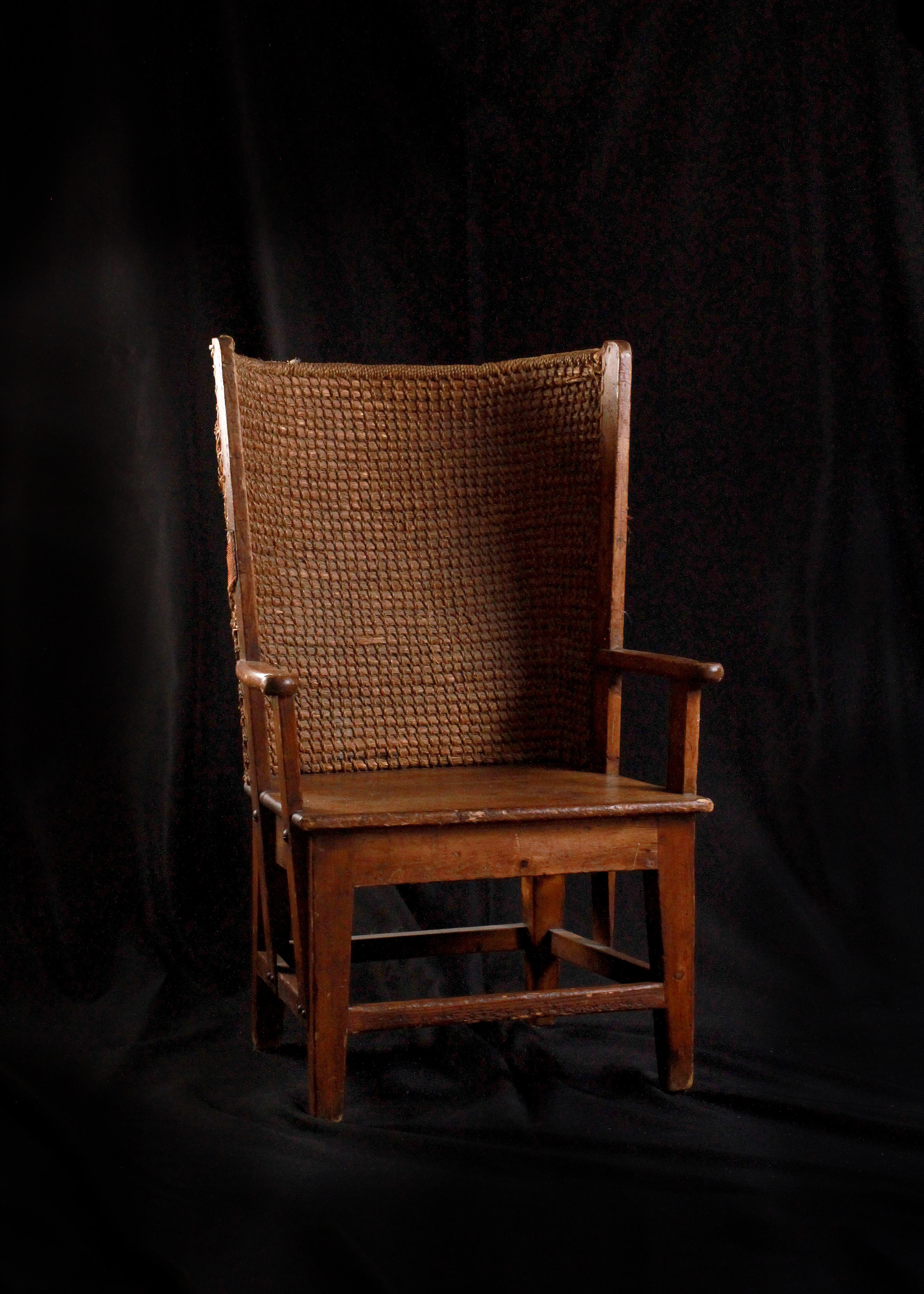 This exquisite Orkney Island chair, a testament to traditional craftsmanship, beckons visitors to step back in time. Carved with care and precision in the year 1900, it embodies the rustic charm and practical elegance of the Orkney