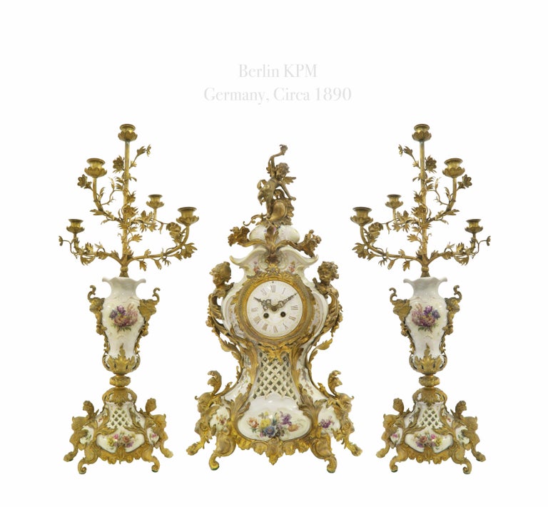 19th C. Ormolu Mounted Berlin KPM Porcelain Clock Set. Circa 1890

KPM porcelain clock set, c.1890
Candelabra Height: 32.5