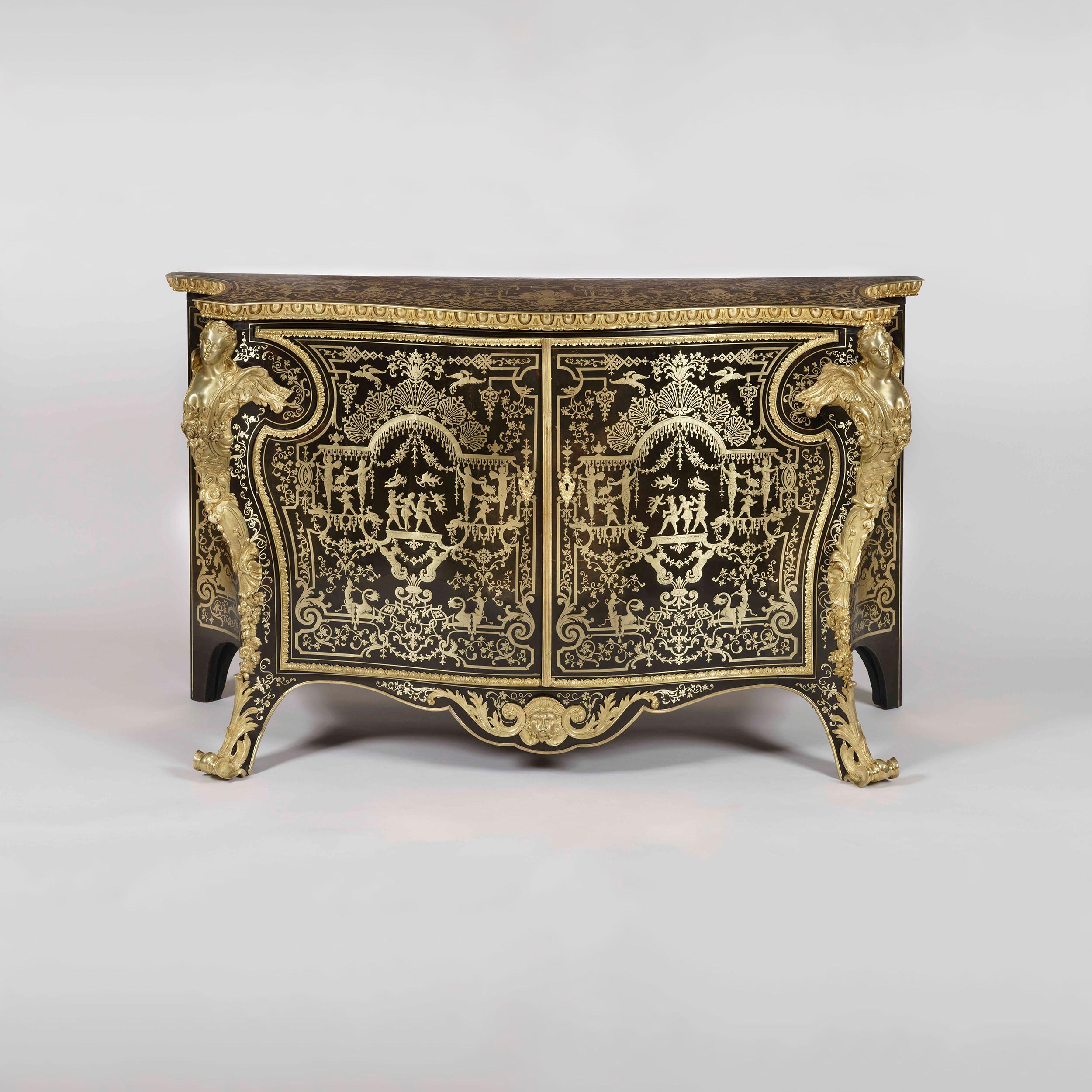 A fine commode By Mellier and Company in the manner of André-Charles Boulle.

Of serpentine form, constructed in ebony with premier-partie inlay into tortoise shell, using designs in the manner of Jean Berain the Elder (1640-1711), and decorated