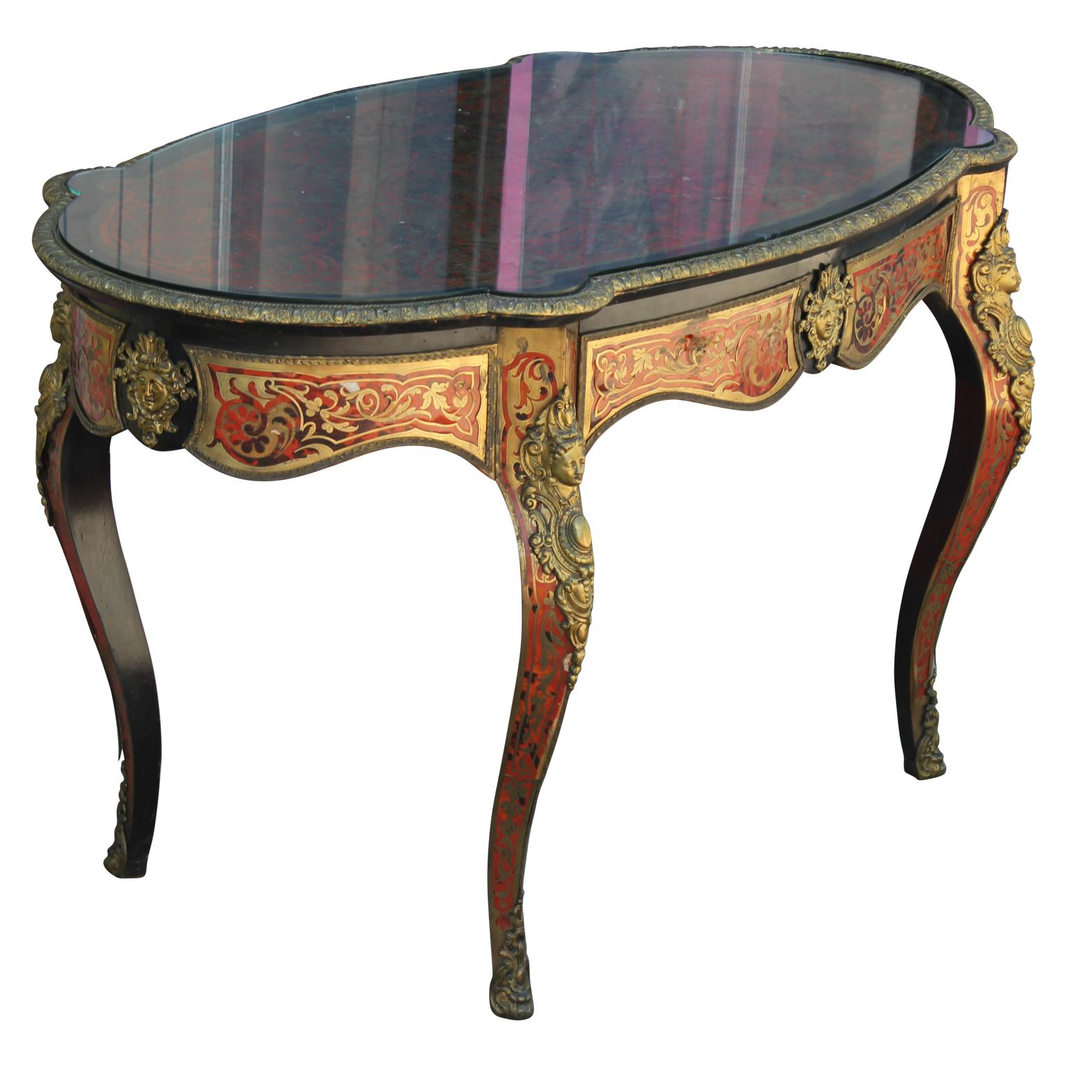 Wonderful and gorgeous 19th century serpentine shaped French Boulle desk with brass inlay. Rare and unique. There are losses to the brass and some imperfections.