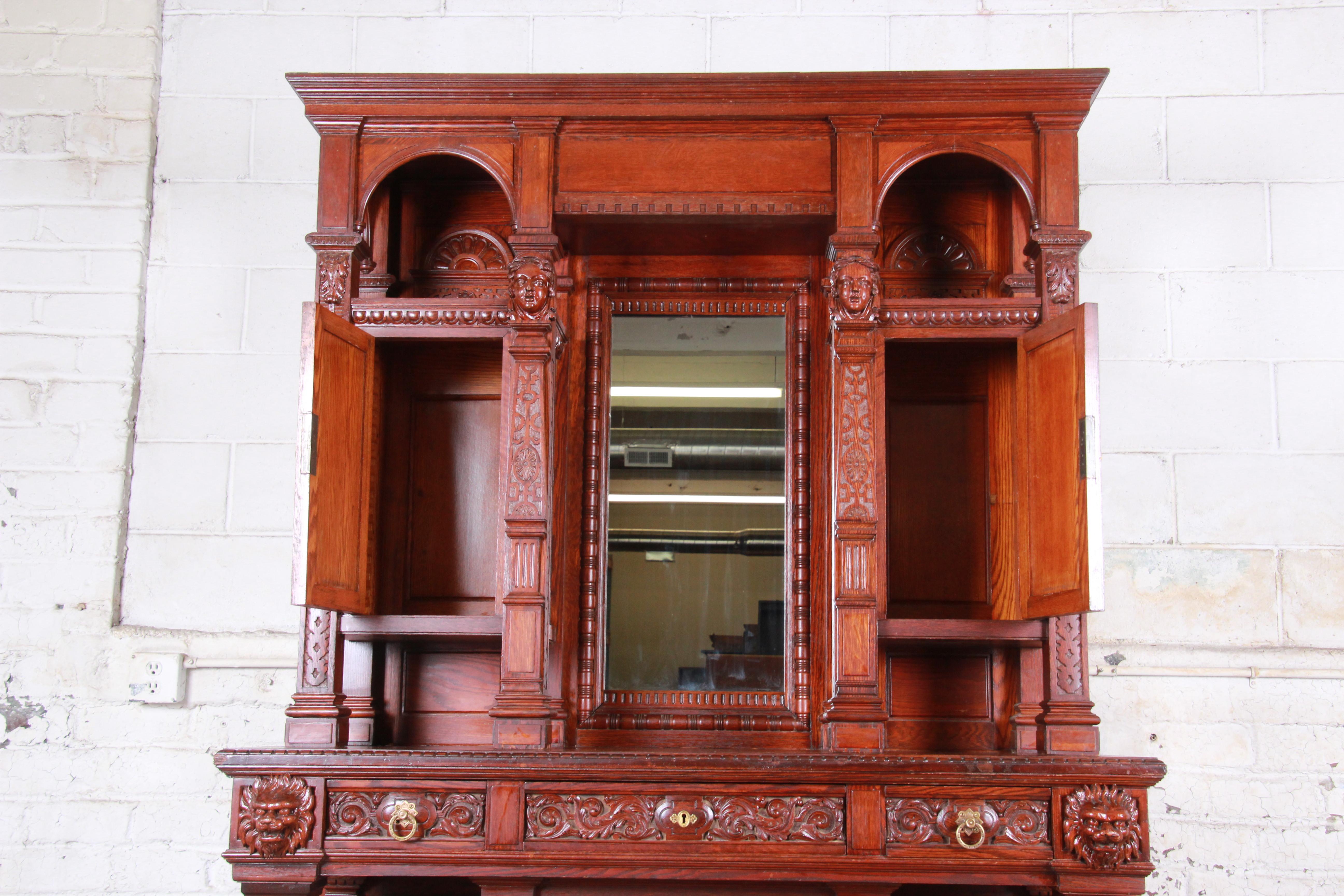 19th Century Ornate French Oak Sideboard Hutch or Bar Cabinet with Carved Faces 2