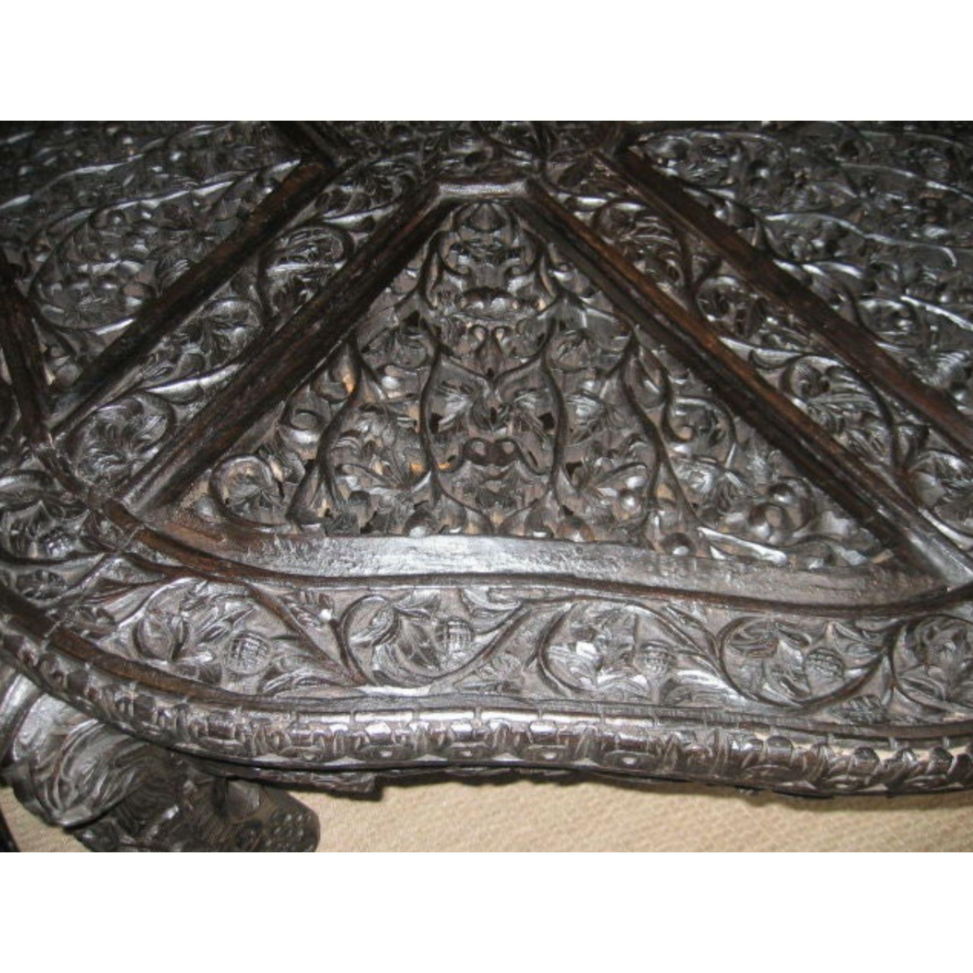ornately carved table
