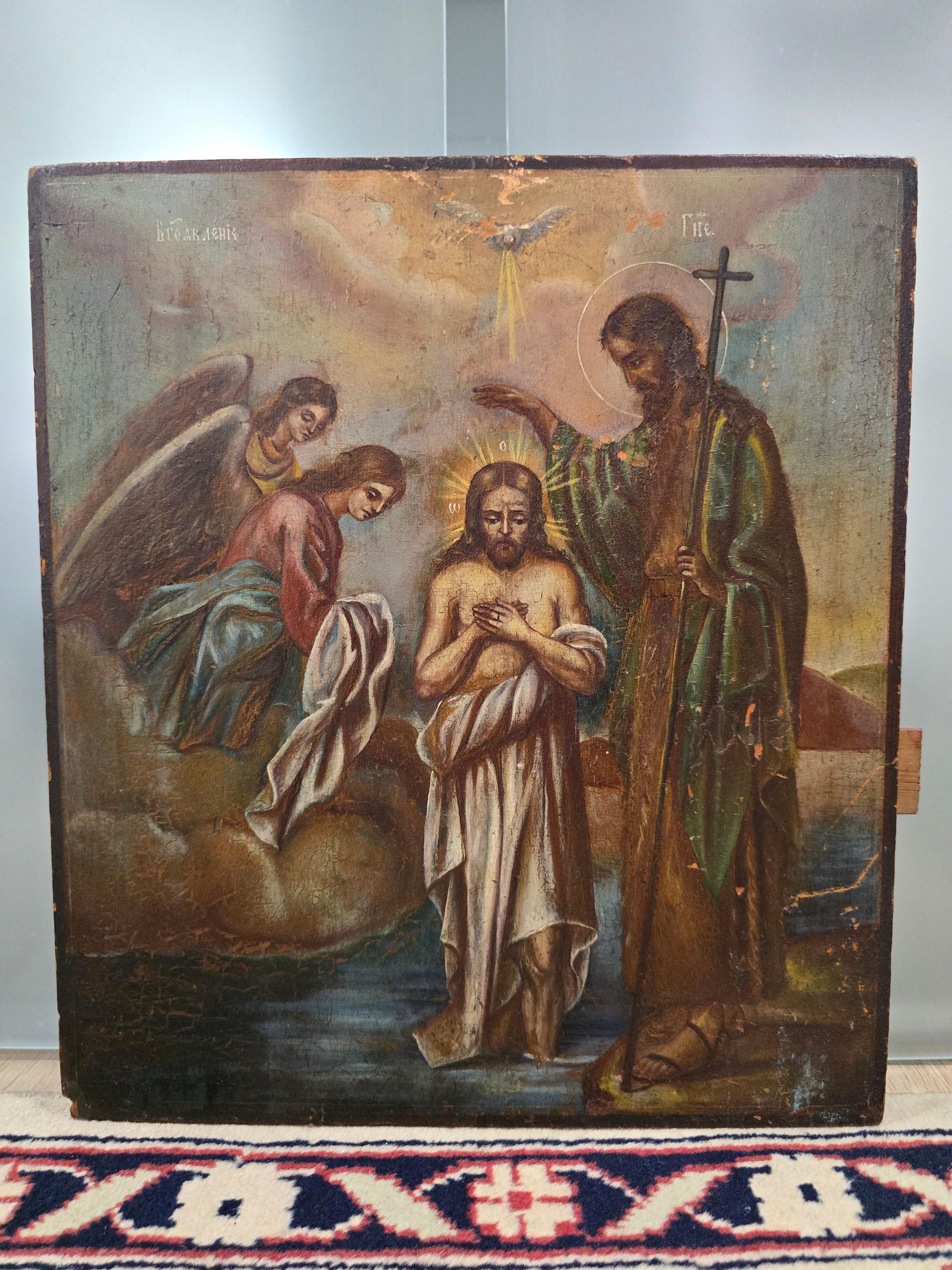 Presenting a magnificent 19th-century Orthodox icon depicting Saint John Christening Jesus. This piece is painted in tempera on a wooden panel, exemplifying traditional religious artistry from this era.

Key Features:

Subject: Saint John