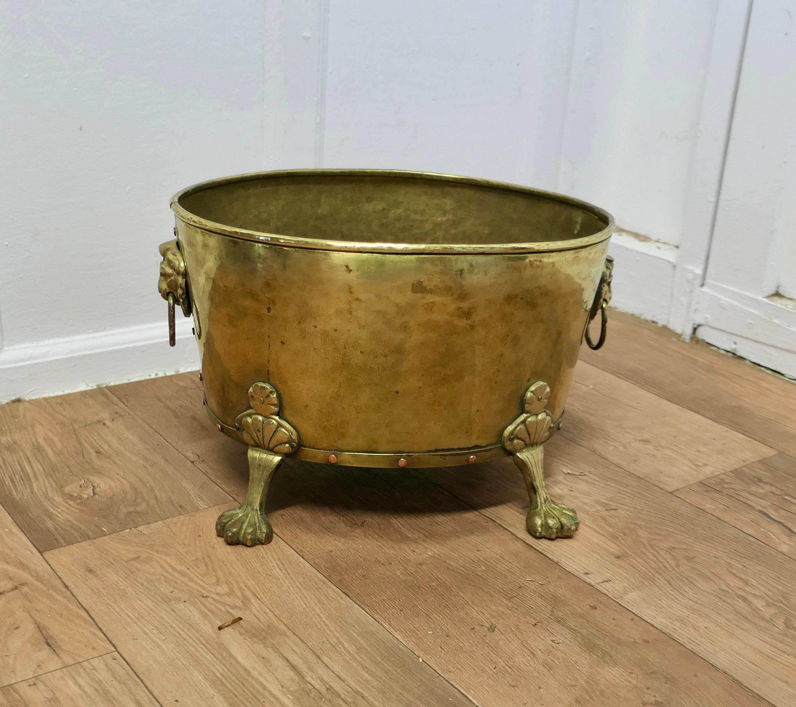 Gothic Revival 19th Century Oval Brass Lions Mask Log Bin      For Sale