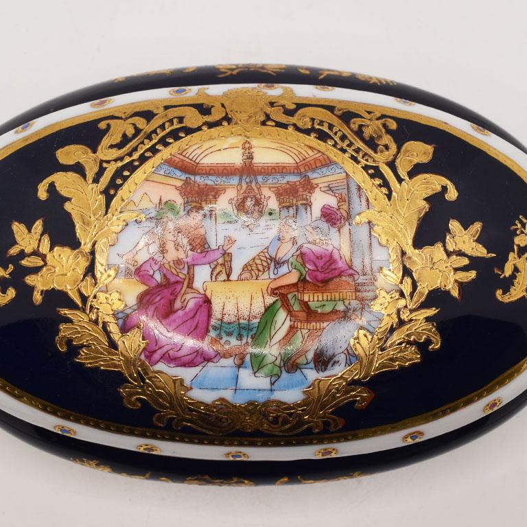 Neoclassical Revival 19th Century Oval French Gilt Cobalt Blue Sèvres Porcelain Box with Lid For Sale