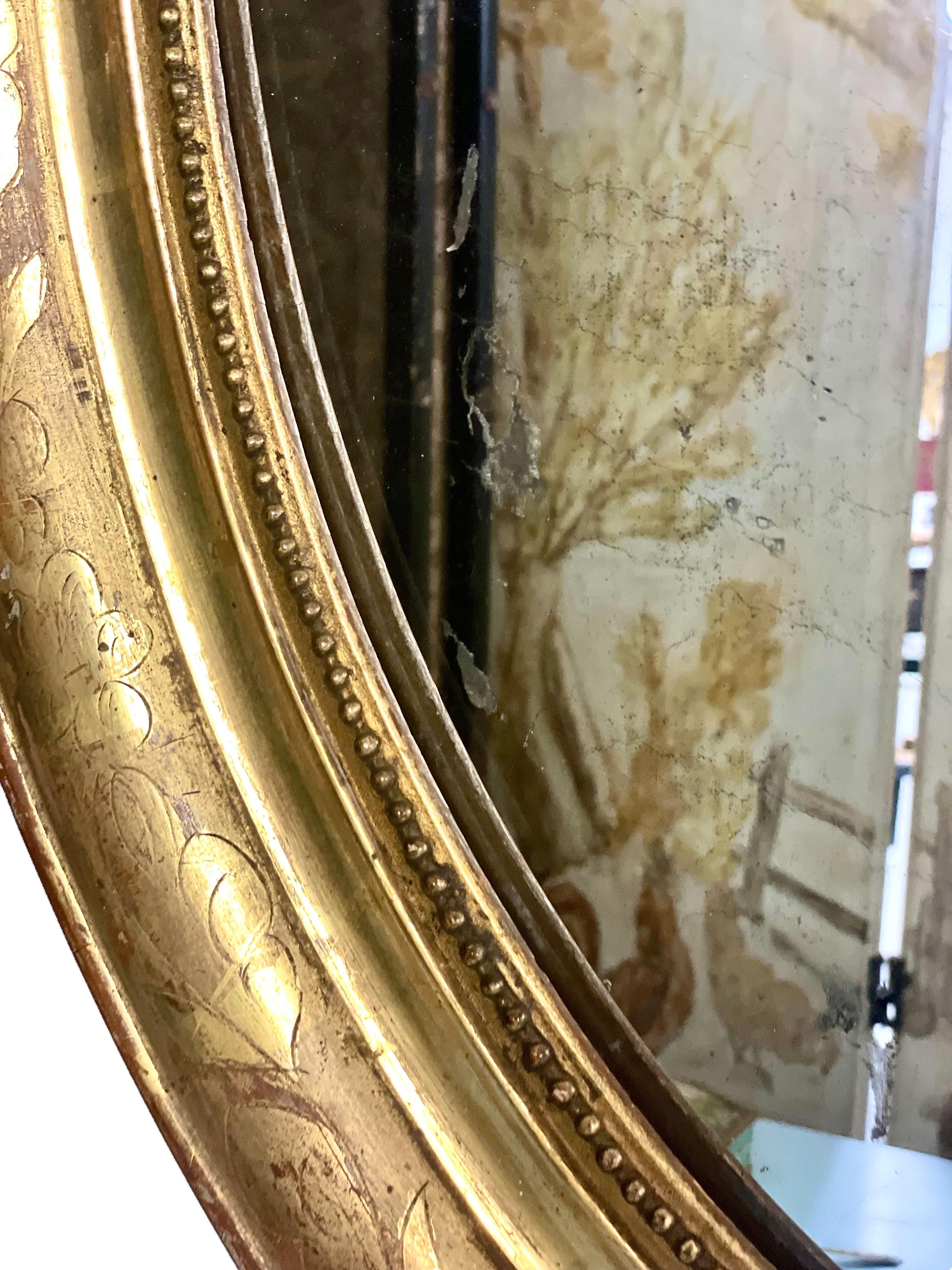 Miroir mural ovale doré du 19e siècle Bon état - En vente à LA CIOTAT, FR