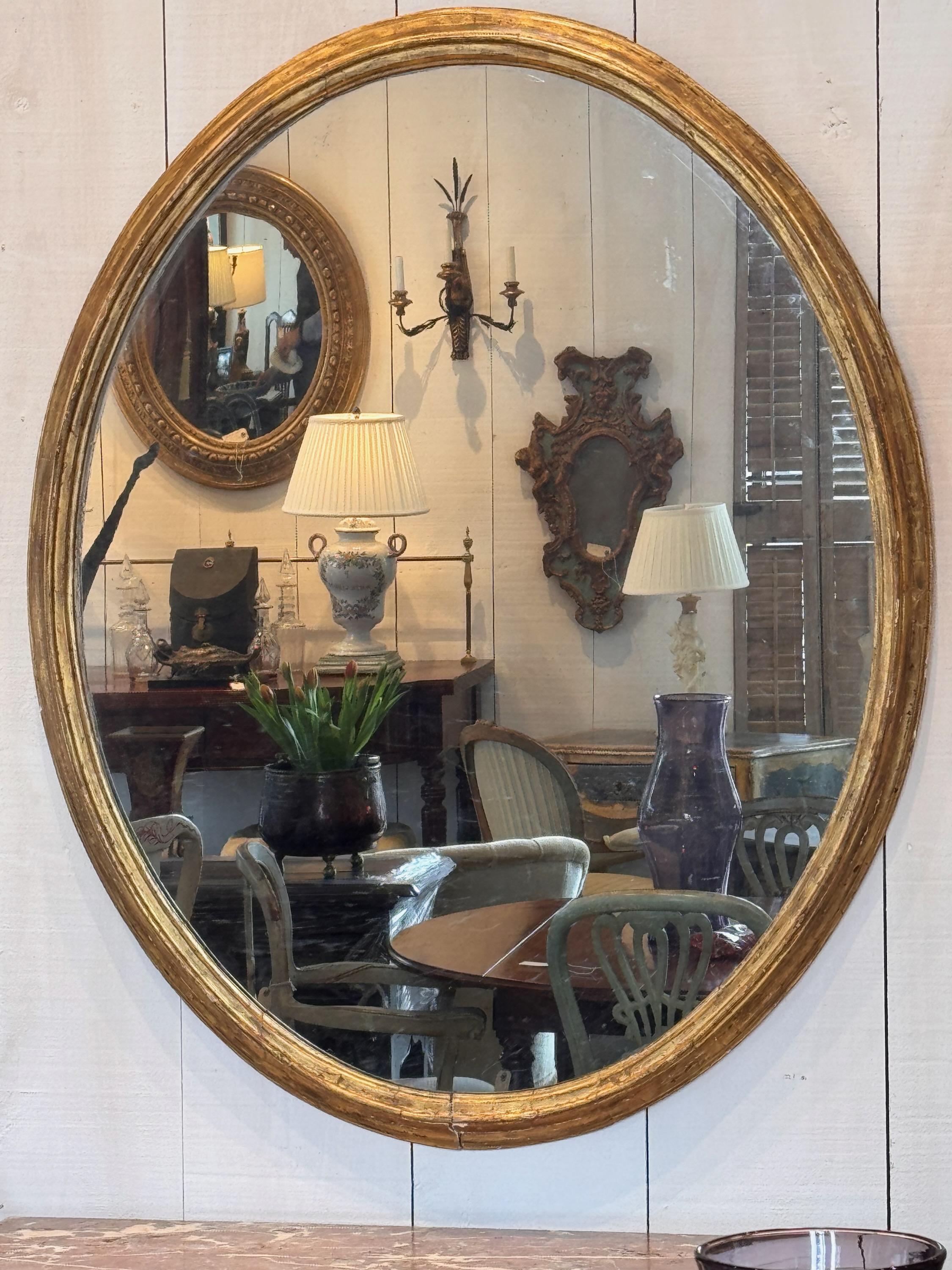 A large Giltwood mirror. Simple and elegant.