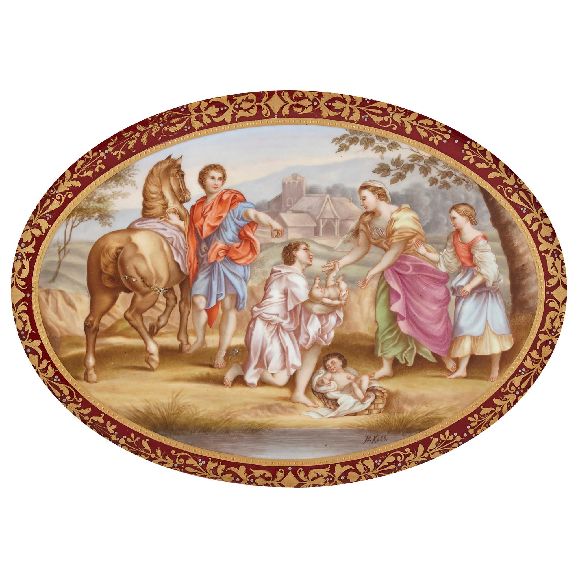 19th century oval porcelain plaque by Royal Vienna
Austrian, 19th century
Measures: Frame: Height 43cm, width 52cm, depth 2cm
Plaque: Height 24cm, width 34cm, depth 0.5cm

This beautiful porcelain plaque is contained within an ornate pierced