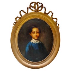 Retrato ovalado de niña aristócrata del siglo XIX en marco dorado
