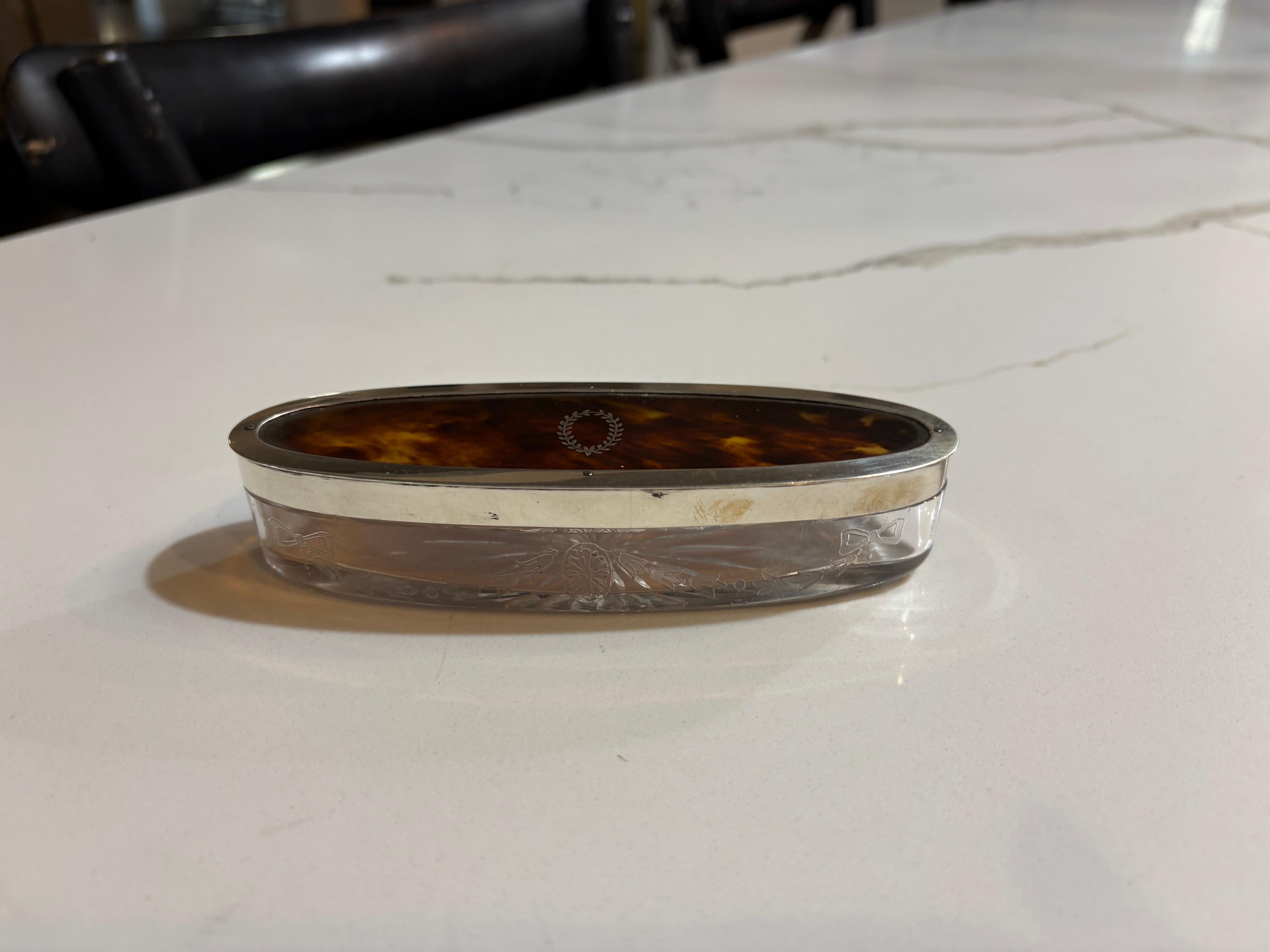 Late 19th Century 19th century oval tortoise shell box with glass base and maker markings. For Sale