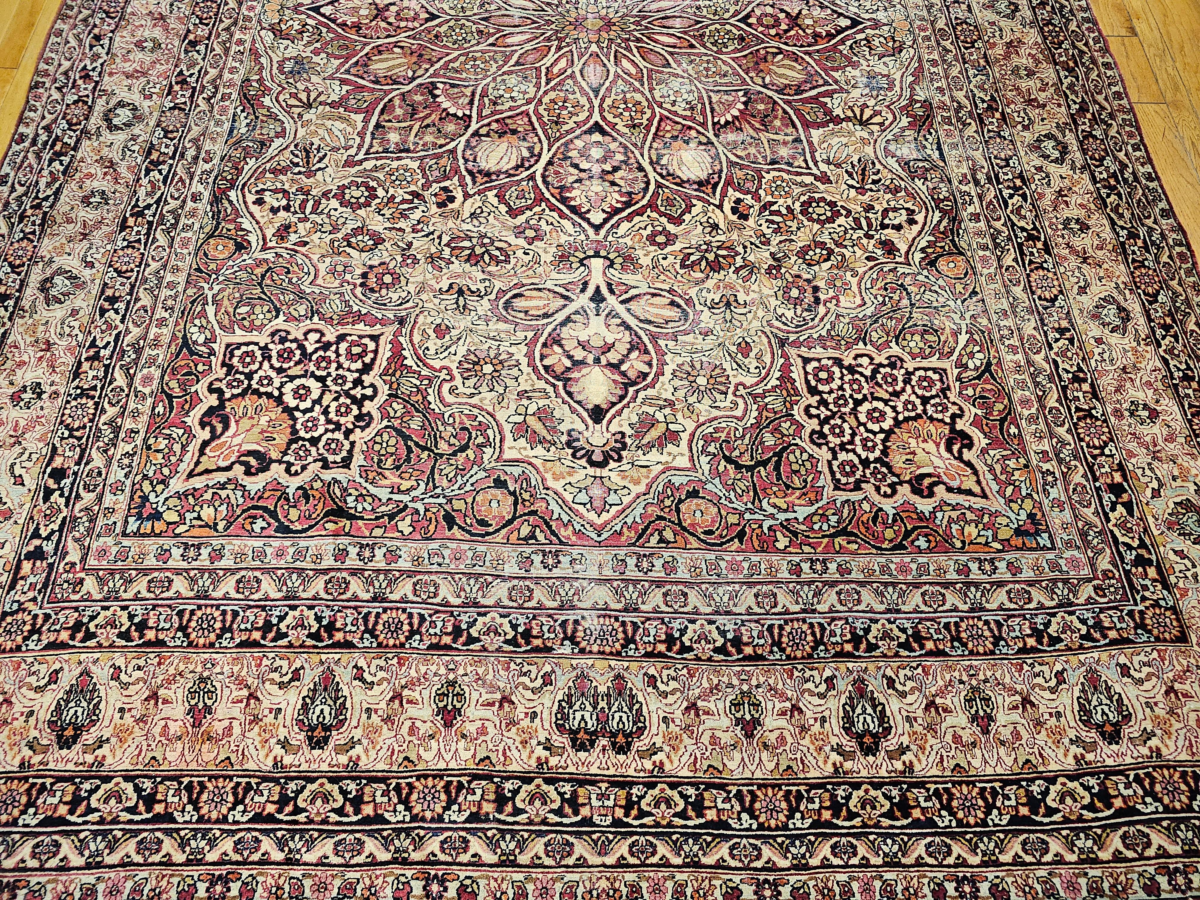 Hand-Woven 19th Century Oversize Persian Kerman Lavar in Ivory, Red, Pink, Blue, Green For Sale