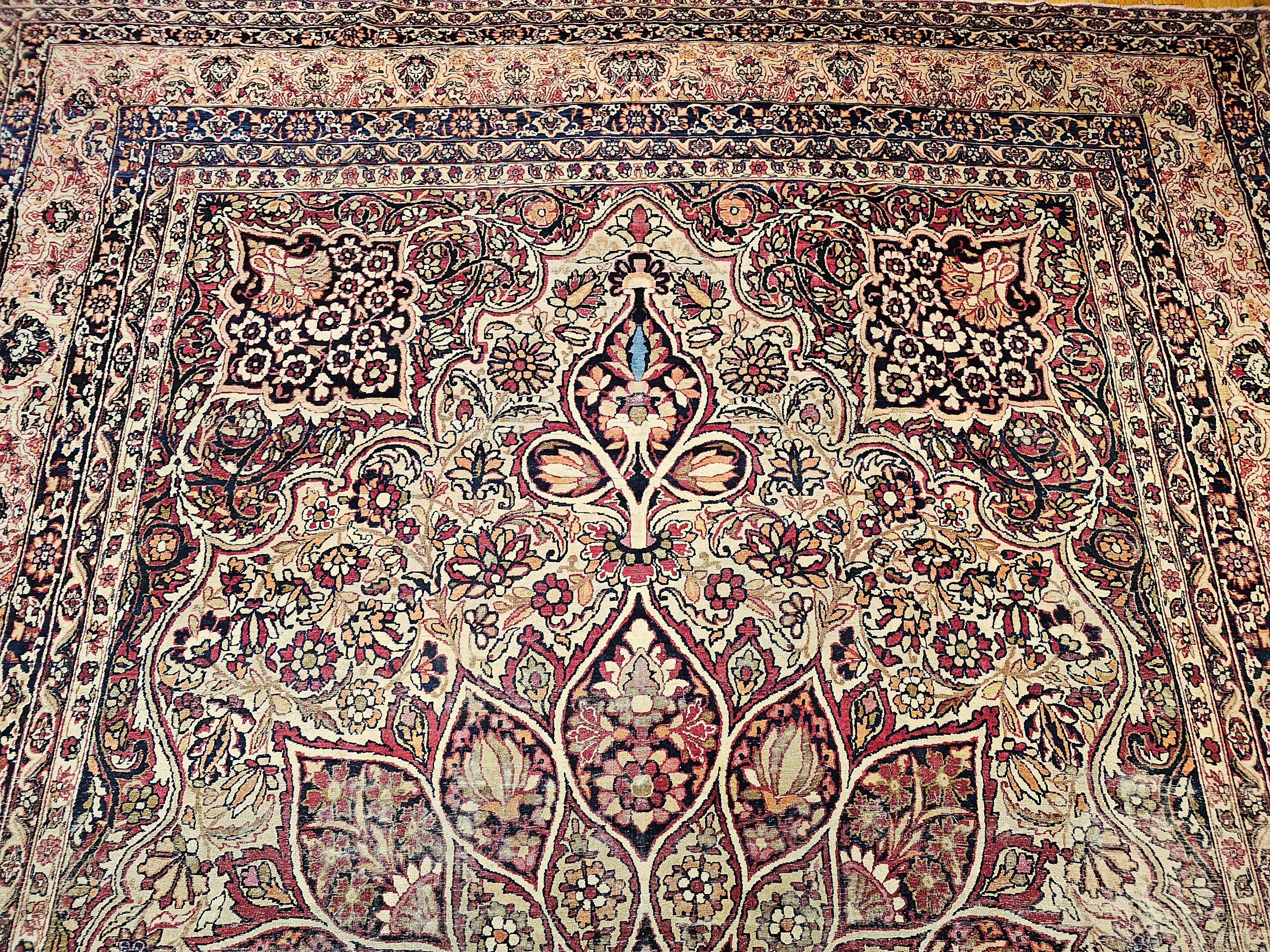 Wool 19th Century Oversize Persian Kerman Lavar in Ivory, Red, Pink, Blue, Green For Sale