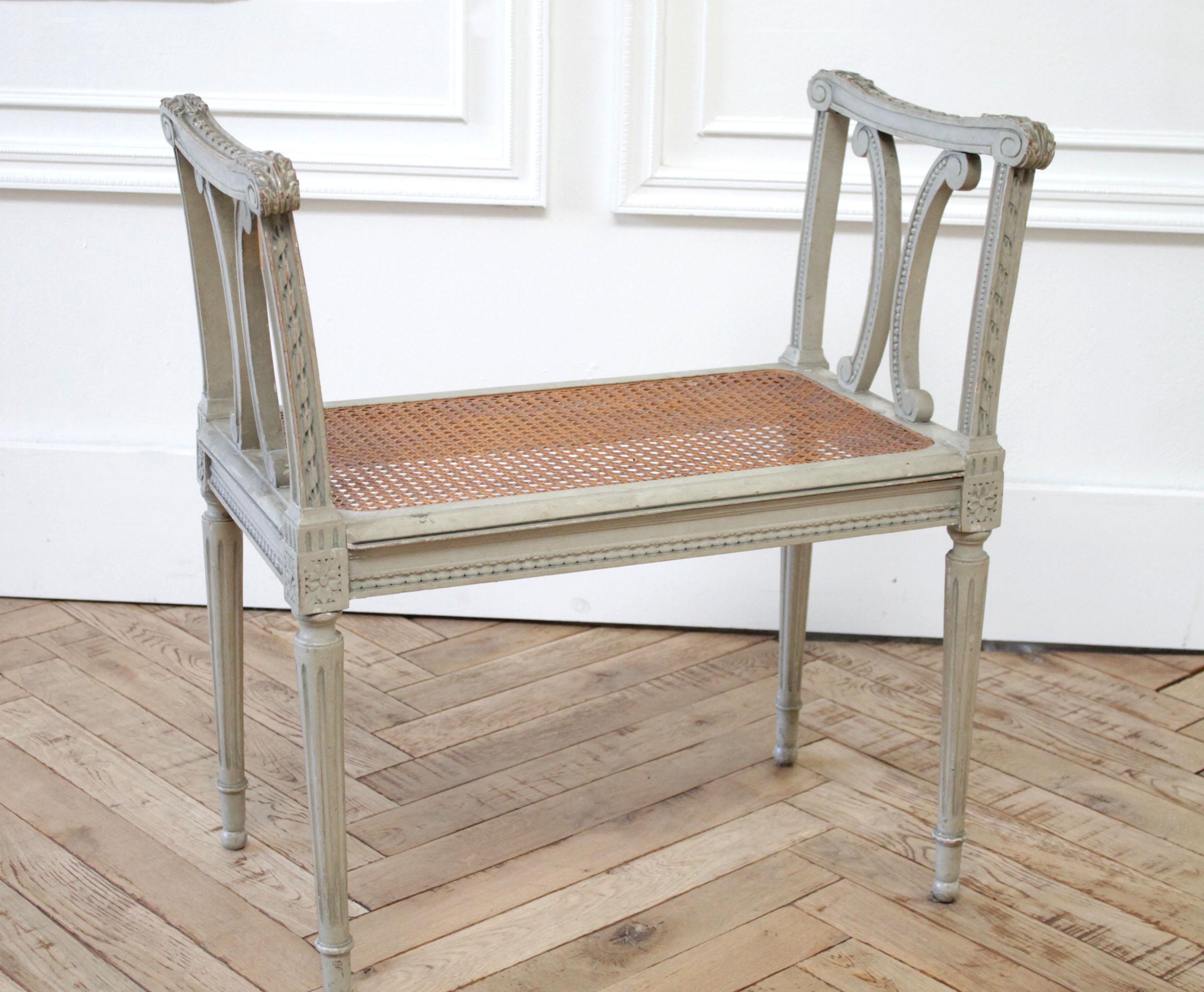 19th century painted and carved Louis XV style vanity bench
Original paint in a Swedish gray color with natural caning on the seat. Has a natural weathered finish patina.
Measures: 26