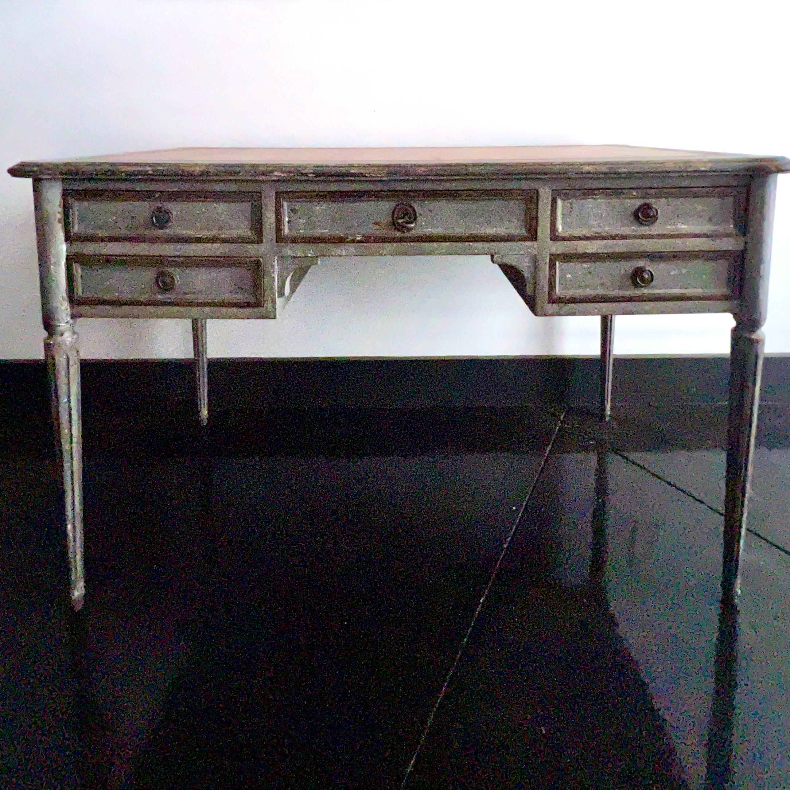 Elegant 19th century French Louis XVI style Bureaux plat with drawers in gray/blue finish. Leather top with nicely stamped and gold leafed embossing design. The back of the desk is trimmed to match the front in faux partner desk style.
Kneehole: