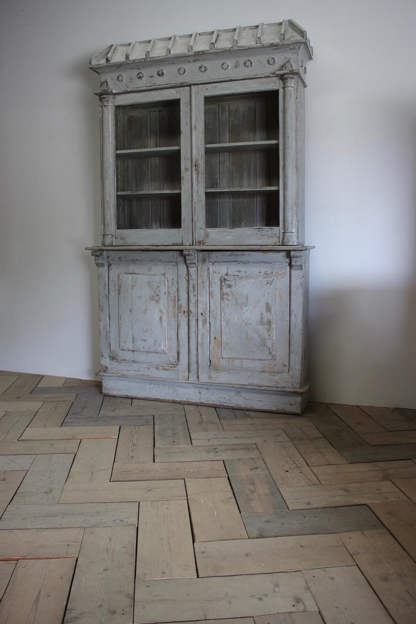 A good quality and of great proportions, 19th century French painted display cabinet of great proportions with later distressed paint, offering plenty of storage. Ideal for a kitchen.