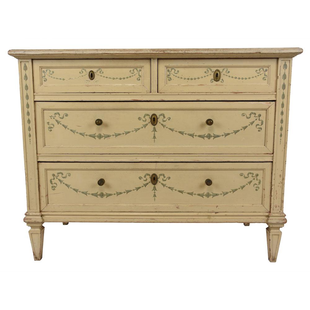 A Louis XVI antique chest of drawers crafted from maple wood that has its original painted in antique yellow color with a white marble top and is in great condition. The facade of the 1870s dresser is adorned with painted decorations of floral and