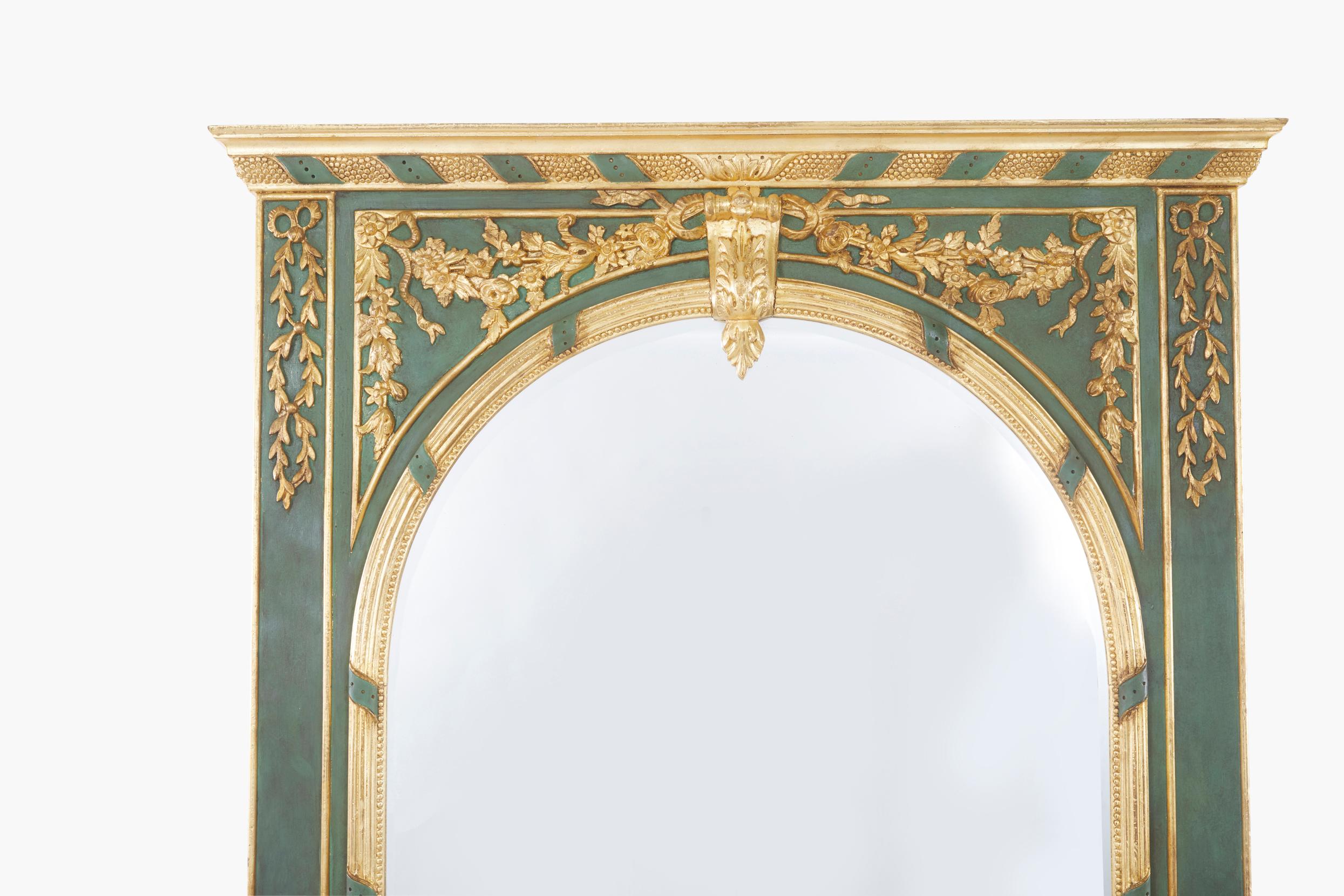 Impressive 19th century painted and gilt frame Italian pier mirror with gilded top design details. The pier mirror is in great antique condition with remarkably intact gold gilt and intricate carved and painted details. Minor wear appropriate to age