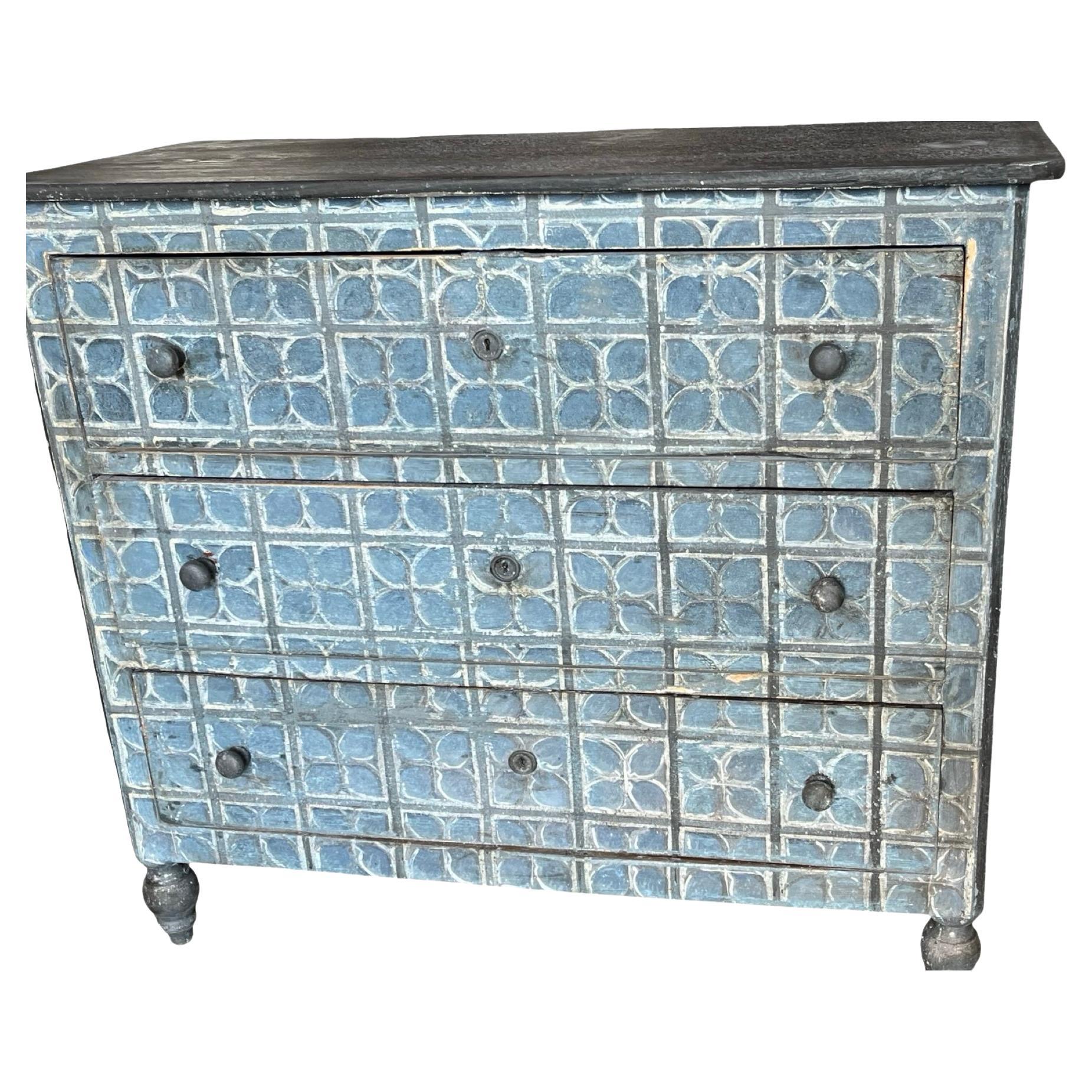 Chest of drawers hand-made in central Italy in the early 1800s using walnut. The chest is very simple and linear but is decorated with beautiful hand-painted geometrical patterns, giving it depth and a very fun and unique look. The chest features
