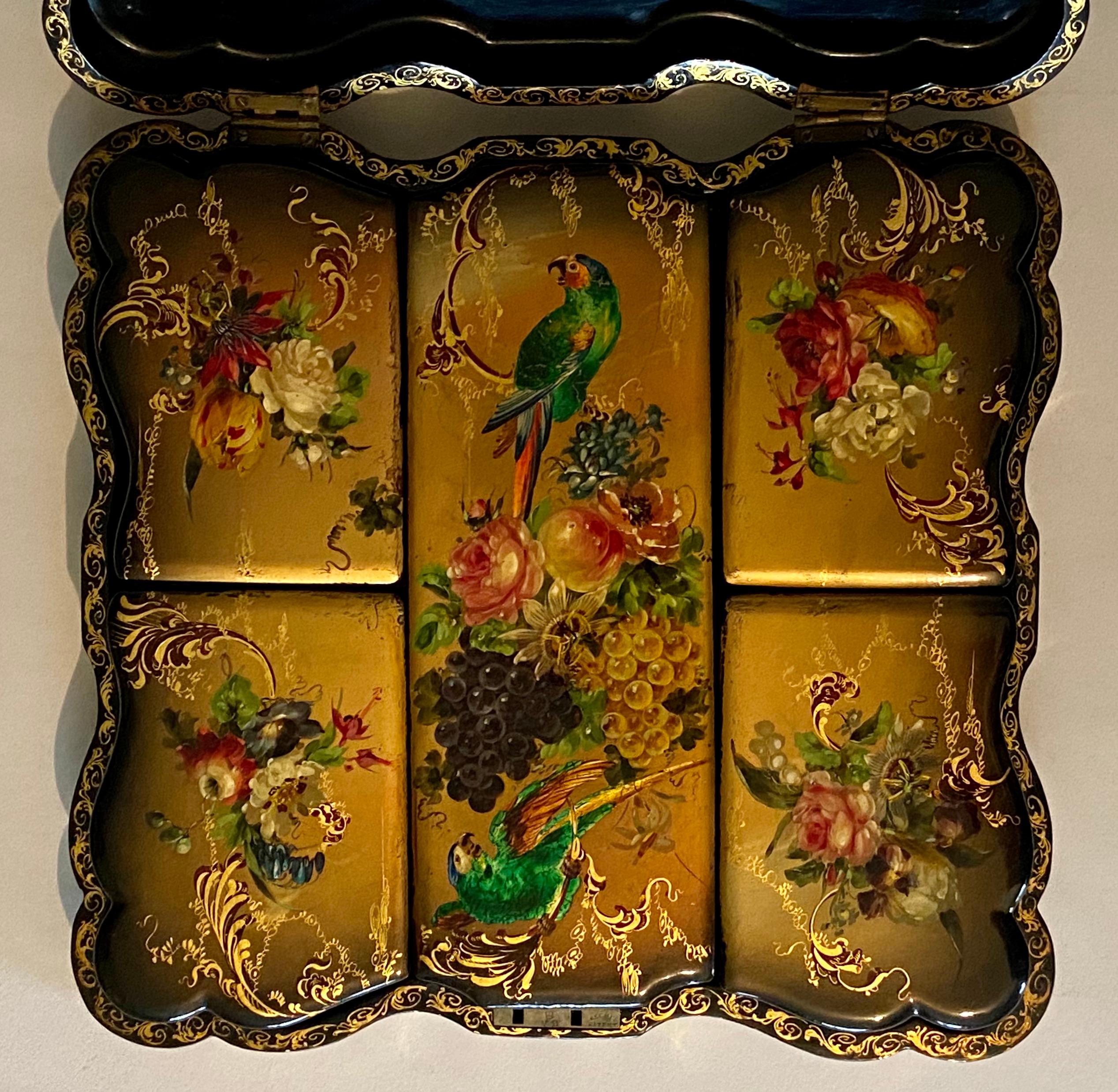 Victorian painted papier mache box enclosing five further painted boxes, decorated with parrots, fruits, foliage and gilded scrolls