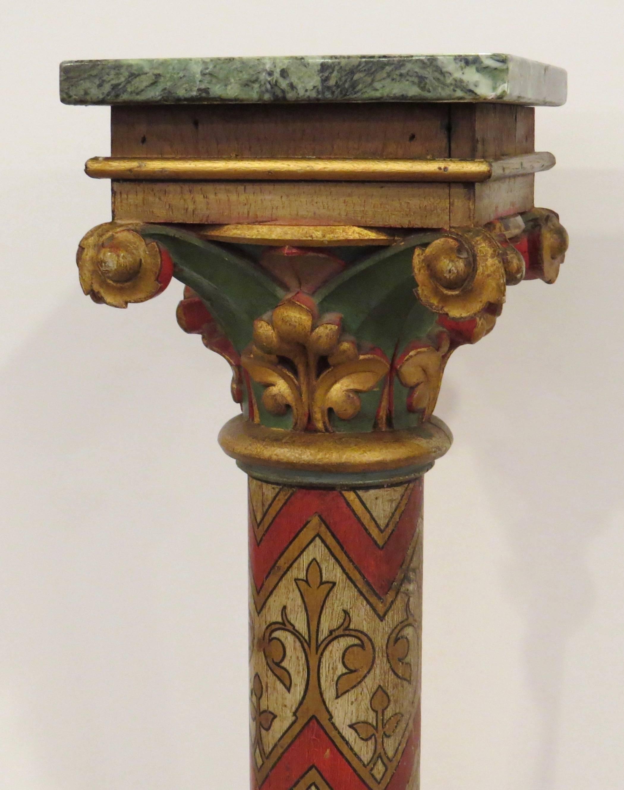 This ornate pedestal is painted with fleur de Lis and has a carved capital at the top. It has a square green marble top surface.




 