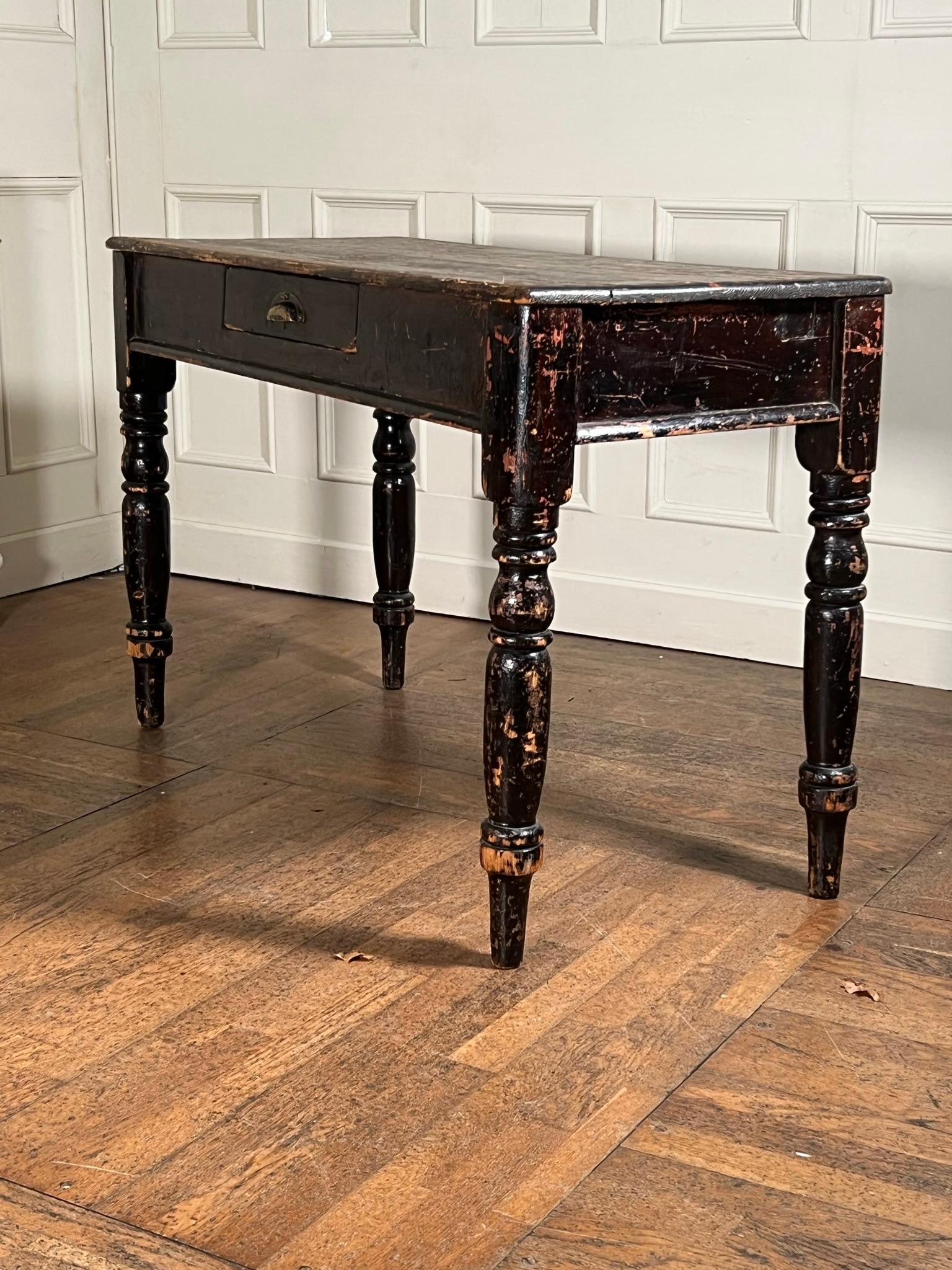 Victorian pine console or side table, boasting layers of original ‘chippy’ paint and just the right amount of wear.

Nicely turned legs support a freshly waxed, scraped plank top with single lower drawer.

English circa 1850

Measurements -