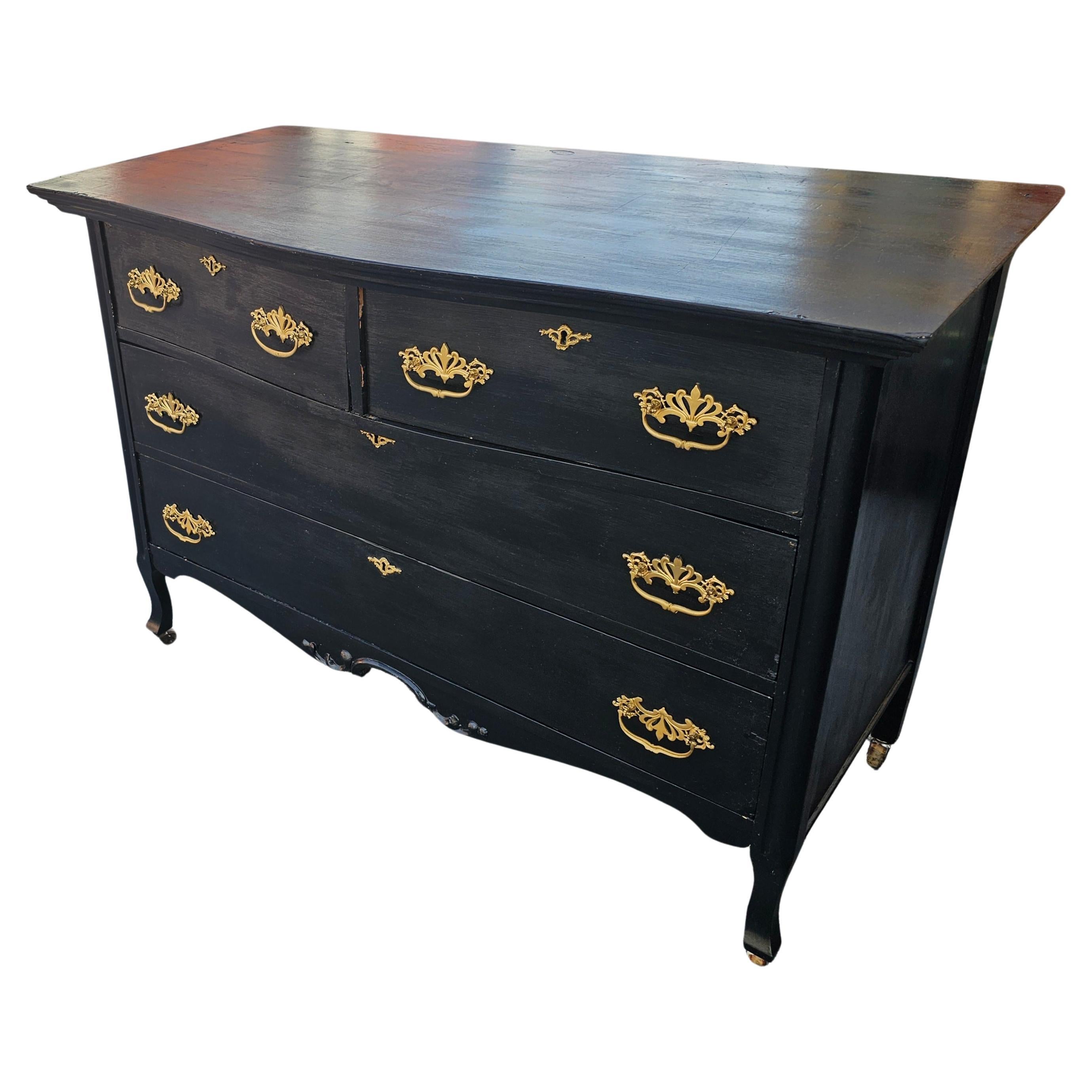 A 19th Century Painted Solid Pine 4-Drawer Dresser on Wheels. Black painted outside and white painted inside. All solid pine inside out. Dovetail drawers. Newer handles. Matching Mirror available in our inventory in a separate listing