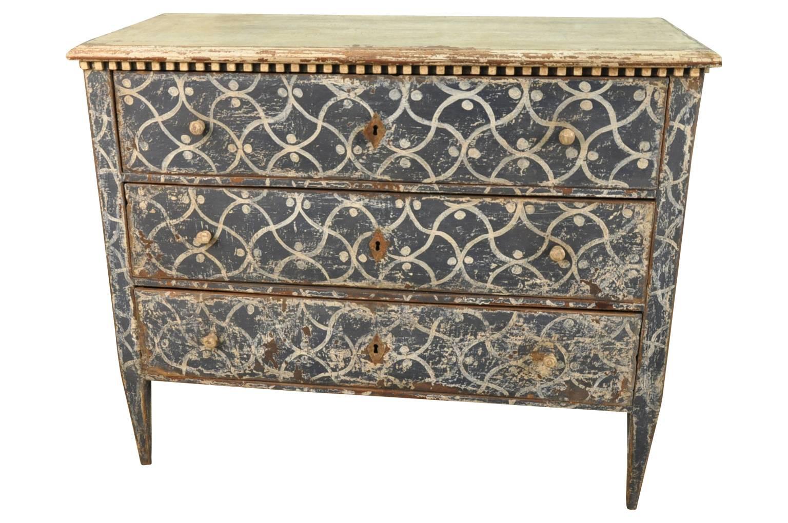 A sensational late 19th century painted commode from Spain. Great construction with dentilated detail and tapered legs. The painted finish is wonderful with lovely motif and texture. Great as a bedside cabinet or converted into a bathroom or powder