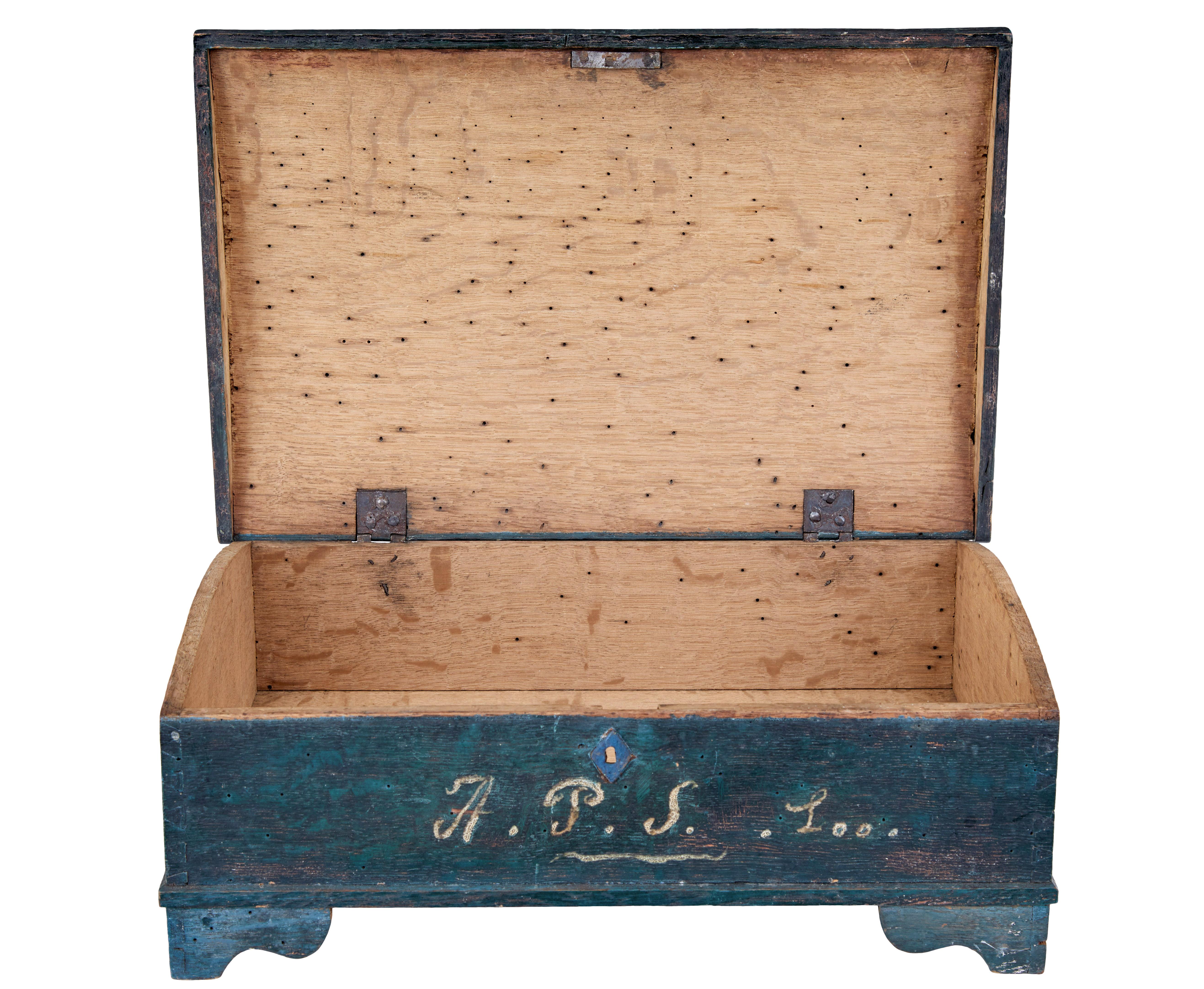 19th century painted Swedish desktop box circa 1840.

Good quality Scandinavian box in original paint.  Hand painted in a blue/green colour scheme.  Further painted with a red cartouche to the lid and the initials a.P.S to the front.

Slight dome