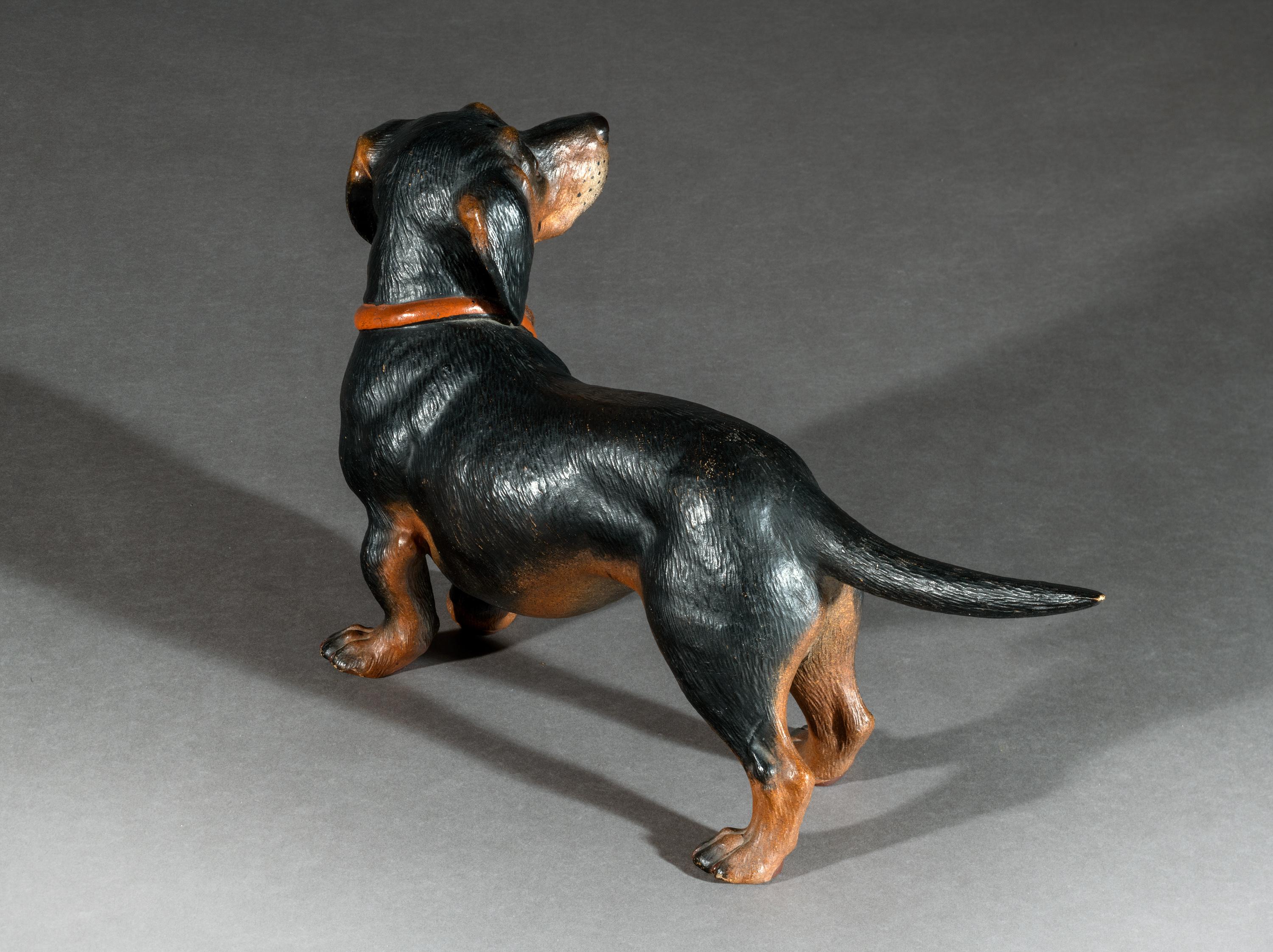 The terracotta figure of a Dachshund hound is near life size. The Dachshund has the original paint and finish and the terracotta is in excellent condition.

On a personal note the hound is very well behaved and does not need walking!