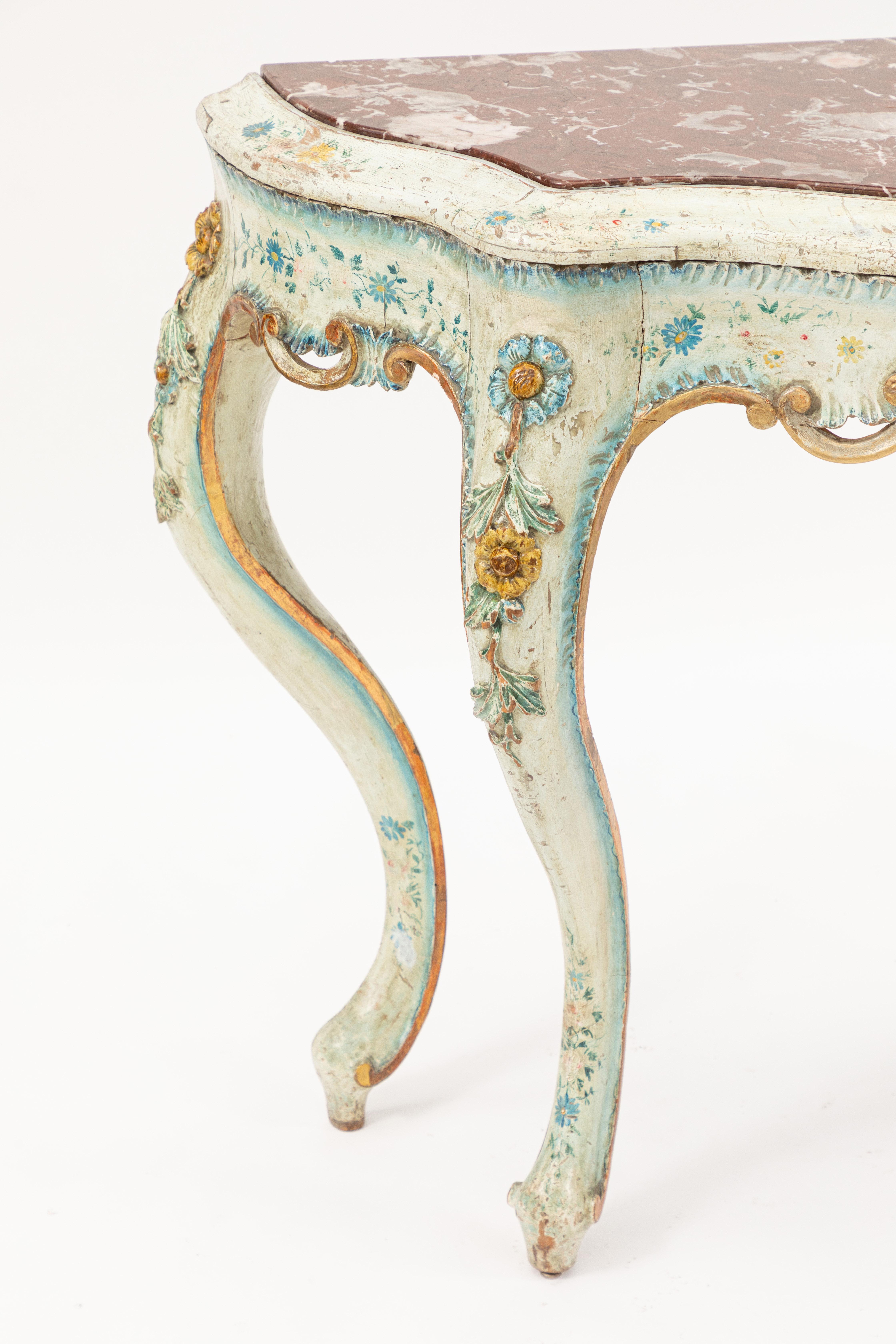 Early to mid-19th century blue and white painted Venetian console with rouge marble topped handprinted flower detail.